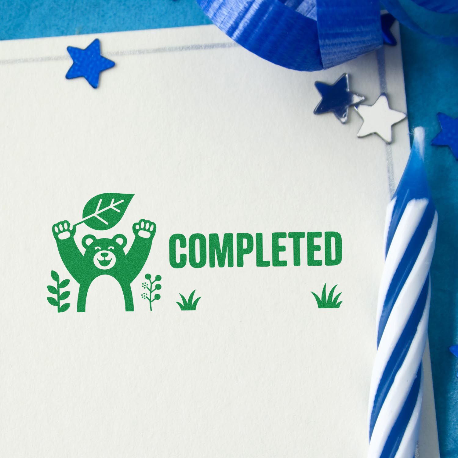 Green bear COMPLETED rubber stamp on paper, perfect for marking finished tasks in crafts, planners, and packaging.