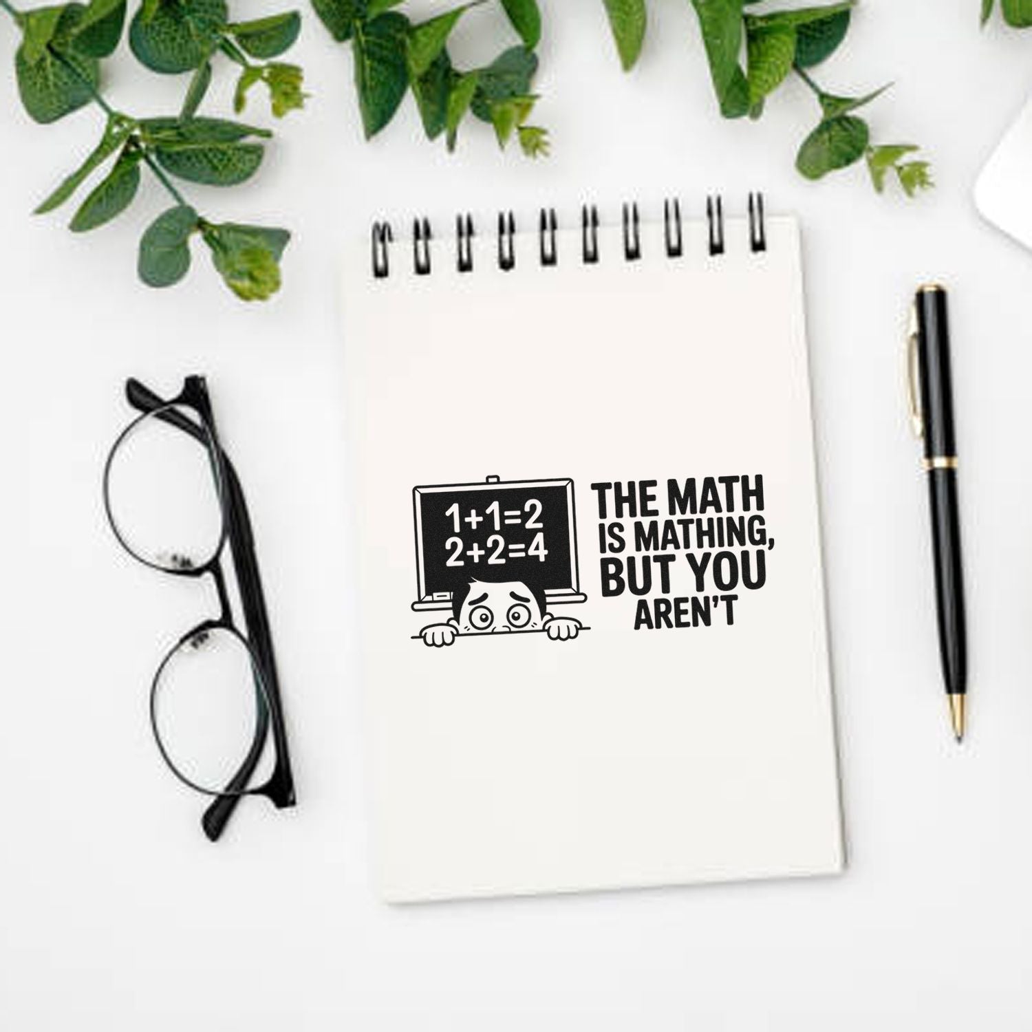 Math teacher rubber stamp design on notebook with quote, The math is mathing, but you arent, and chalkboard cartoon.