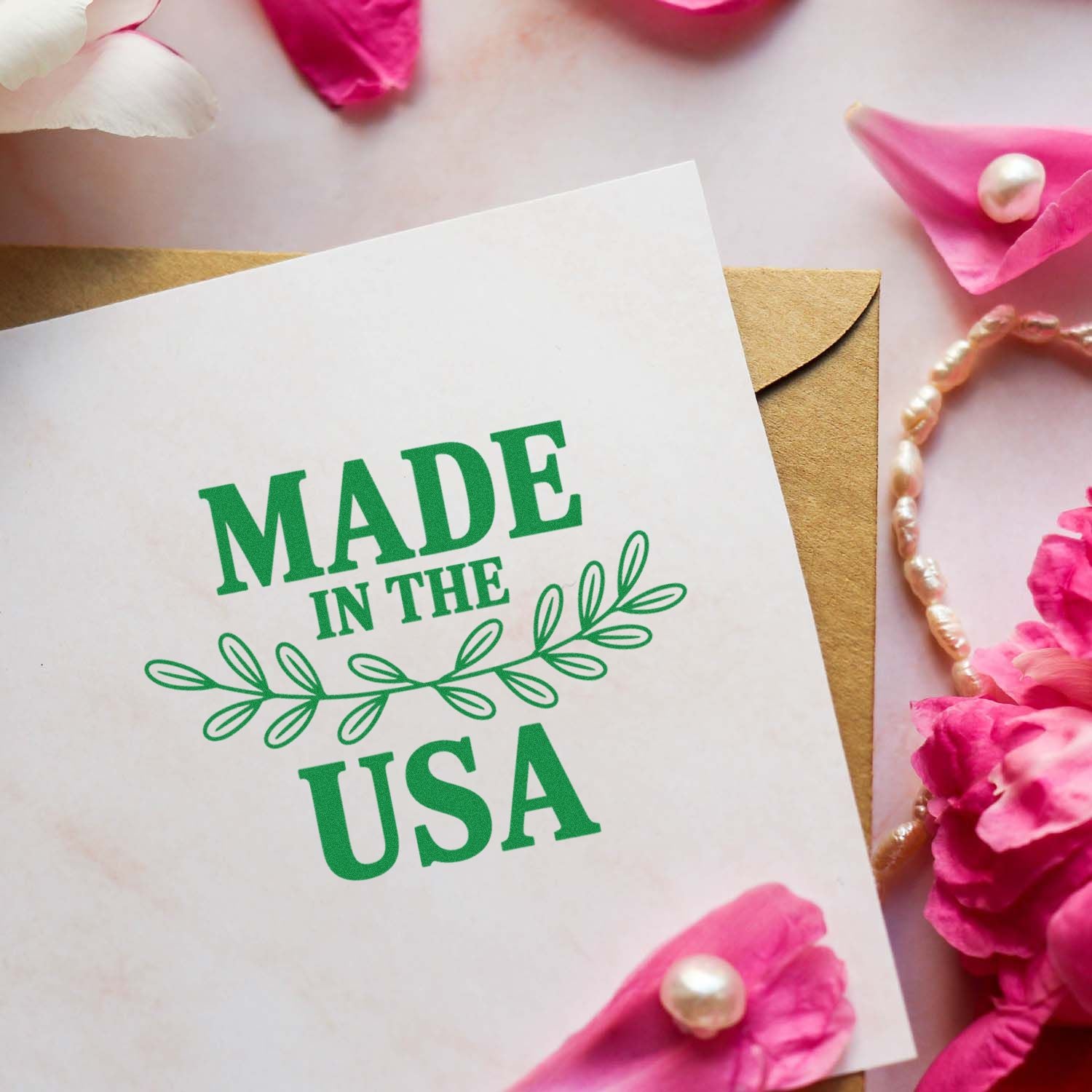 Made in the USA rubber stamp on greeting card with envelope, ideal for handmade packaging and patriotic branding.