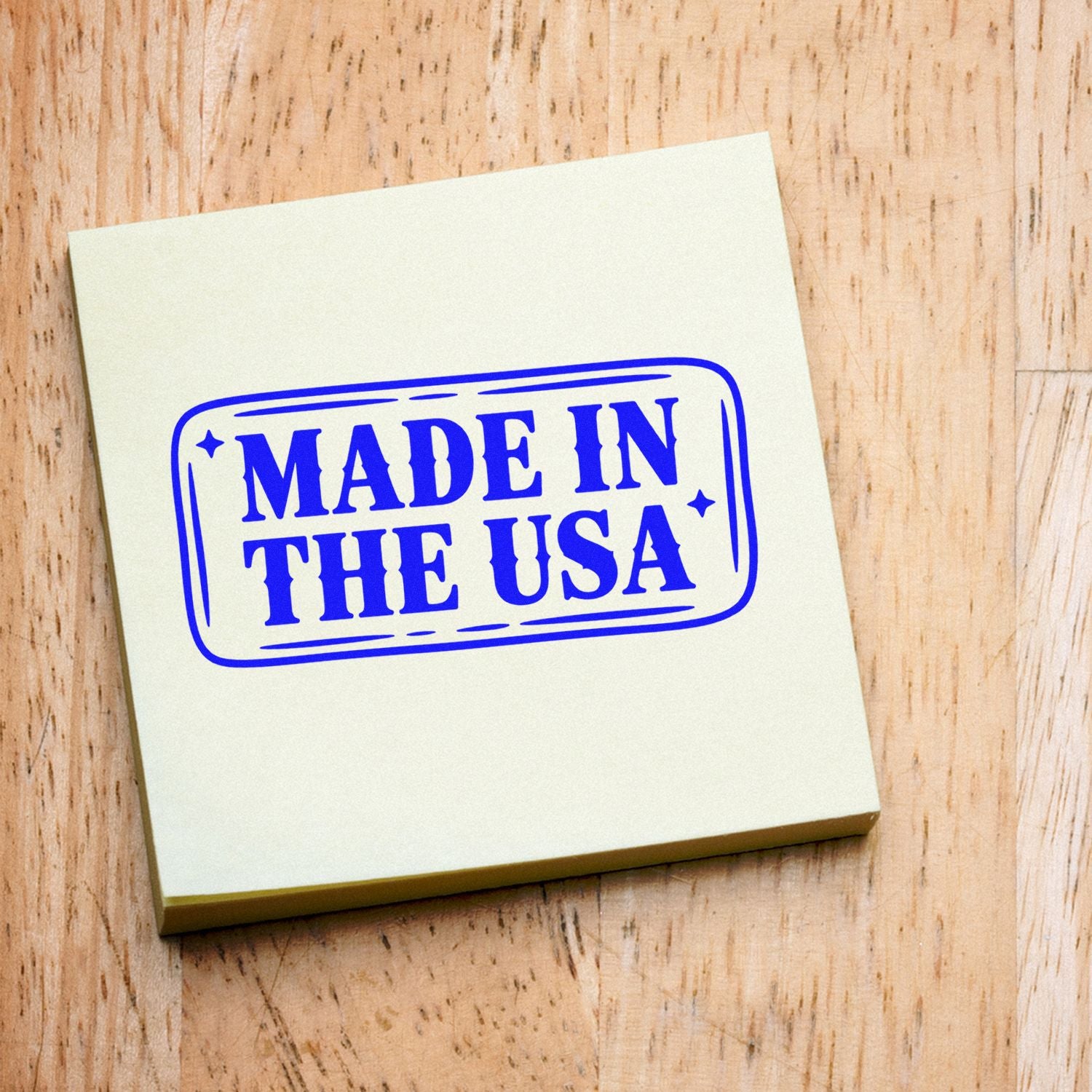 Made in the USA rubber stamp impression on paper, ideal for branding handmade products and patriotic packaging.