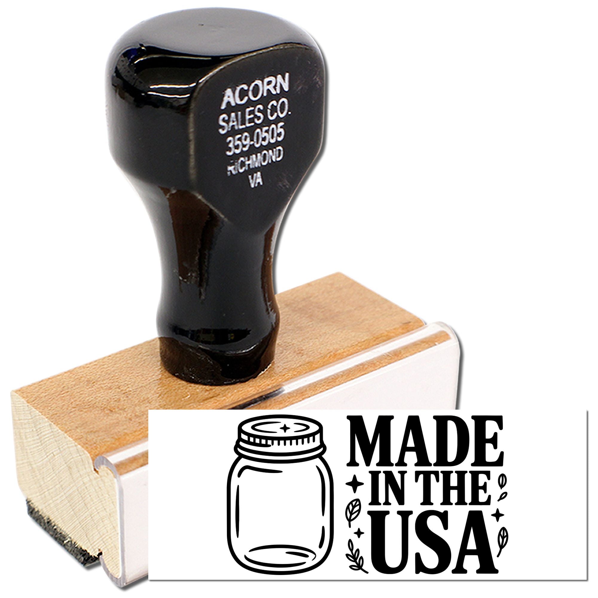 Rubber stamp with Made in the USA design, Acorn Sales Co. handle mounted on a wood block.