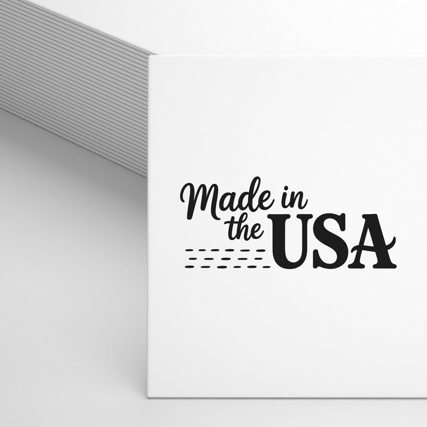 Made in the USA rubber stamp design on white packaging mockup for handmade product branding and patriotic labels.