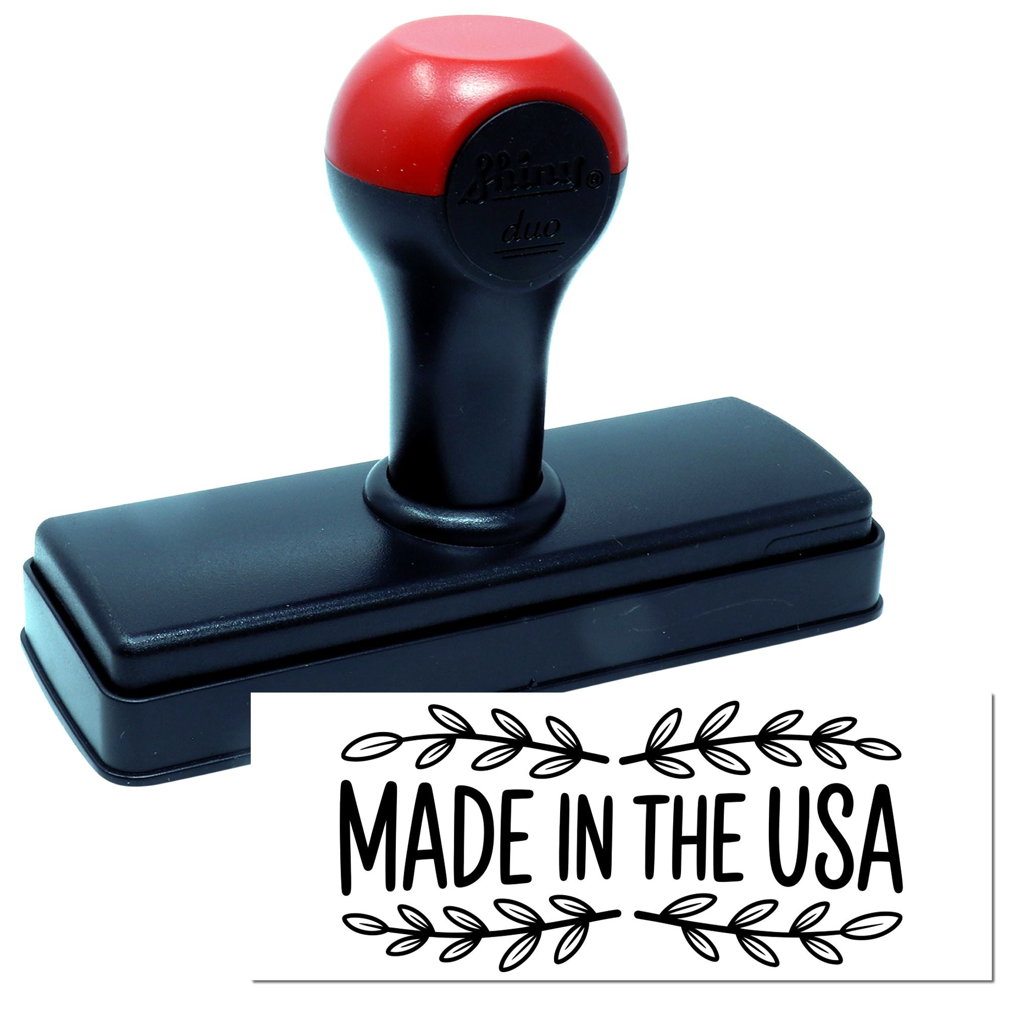 Self-inking rubber stamp with Made in the USA imprint for branding, packaging, and product labeling.
