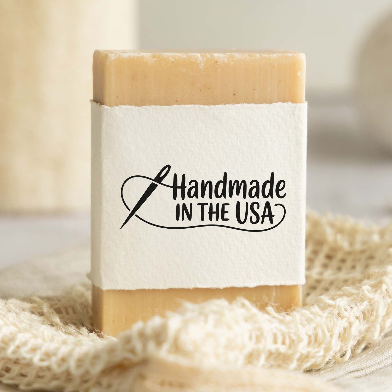 Handmade in the USA rubber stamp on natural soap packaging for artisan products.