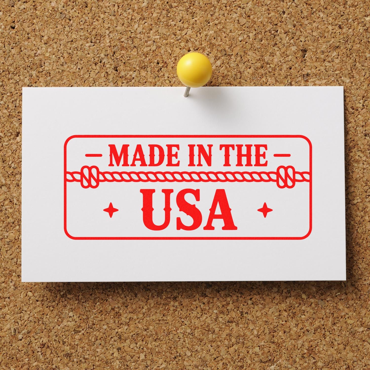 Made in the USA rubber stamp on a pinned white card, ideal for product packaging and patriotic branding.