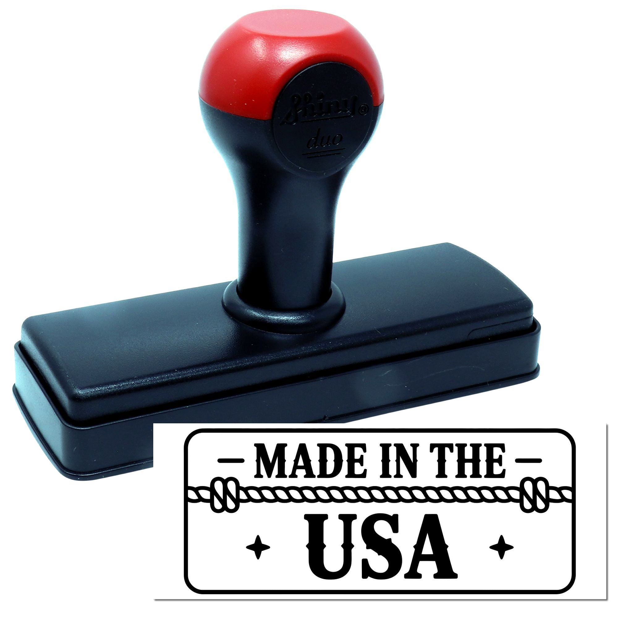 Self-inking rubber stamp with Made in the USA imprint for marking products, packaging, or documents.