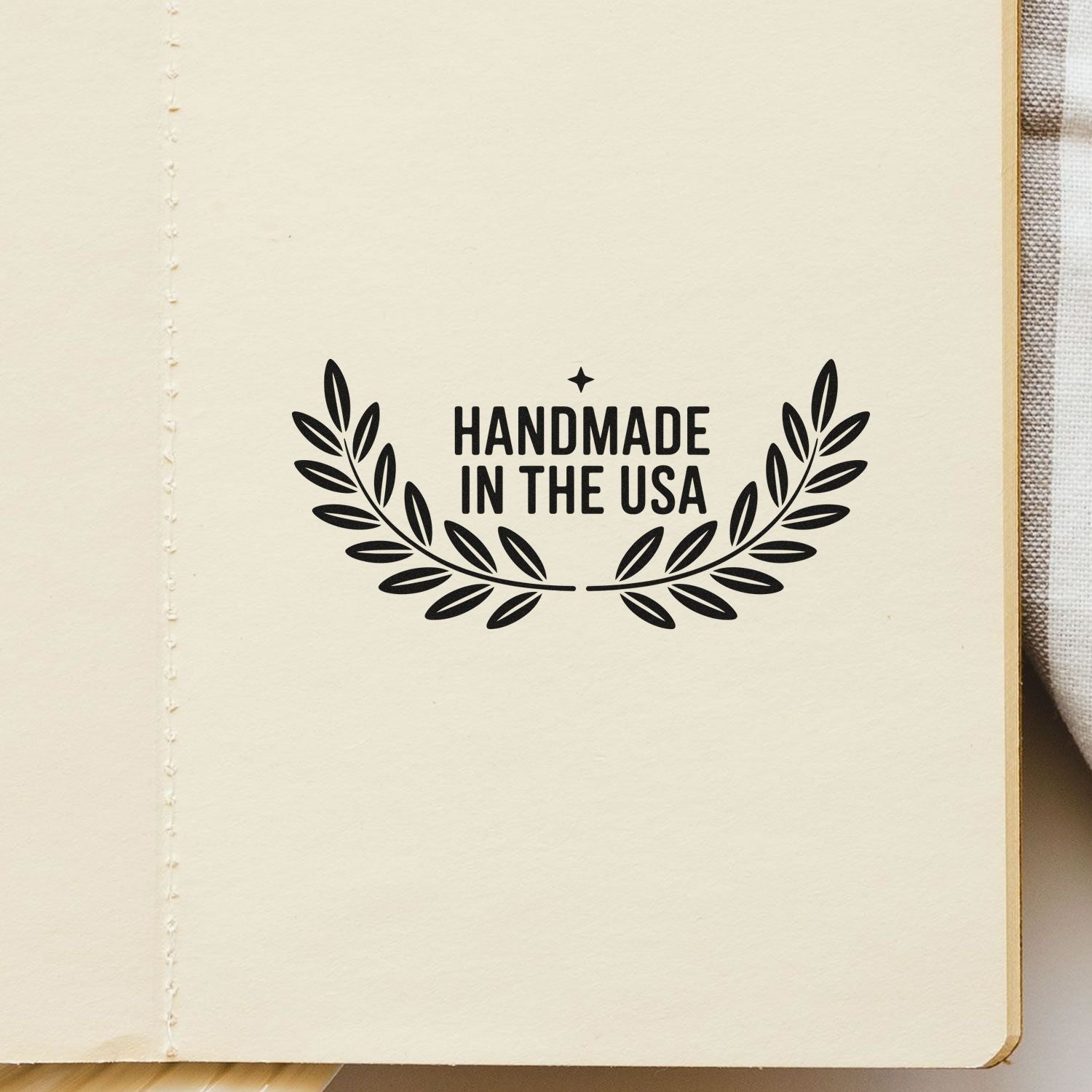 Handmade in the USA rubber stamp with laurel design for artisan product packaging and branding.