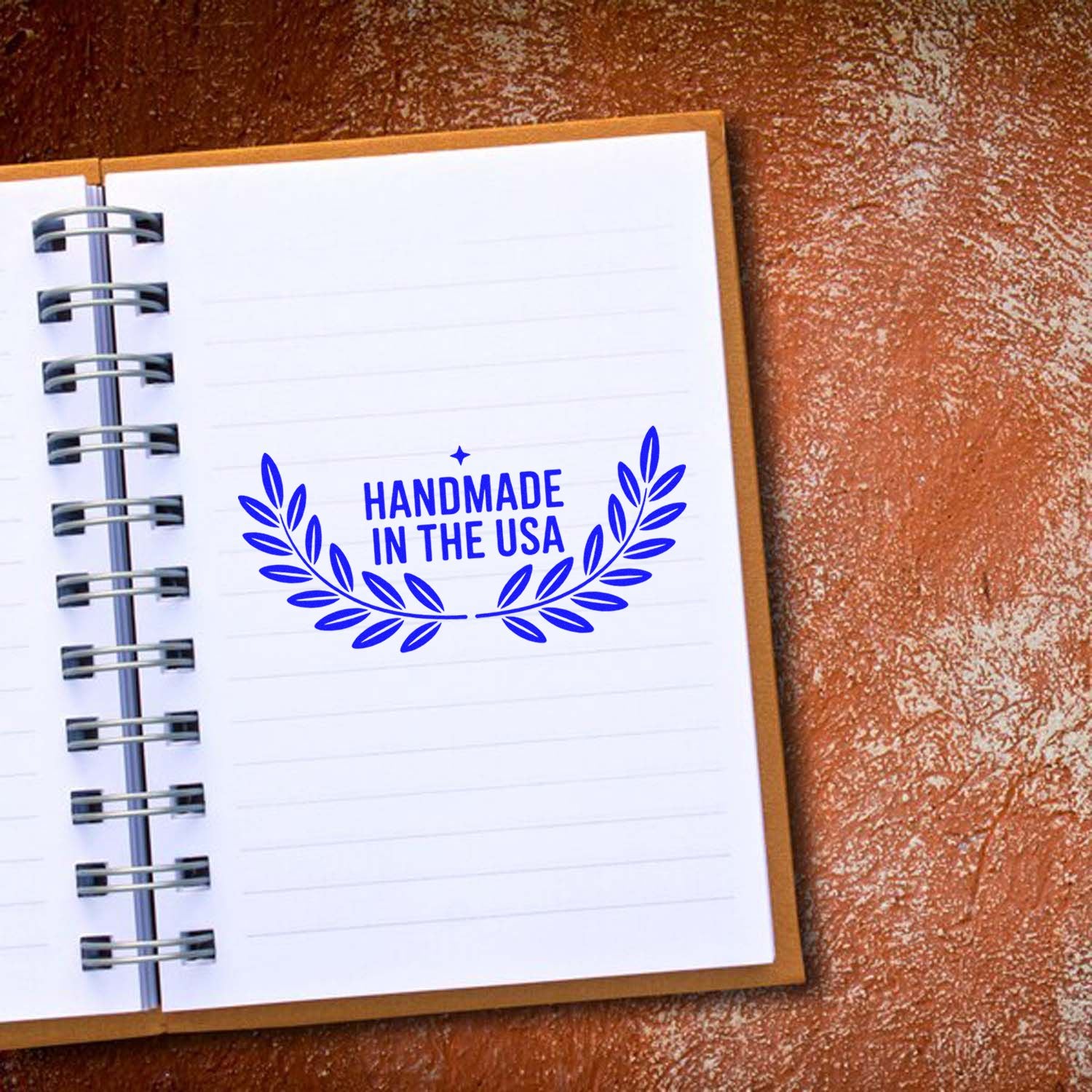 Handmade in the USA rubber stamp design with laurel wreath, ideal for handmade product packaging and branding.