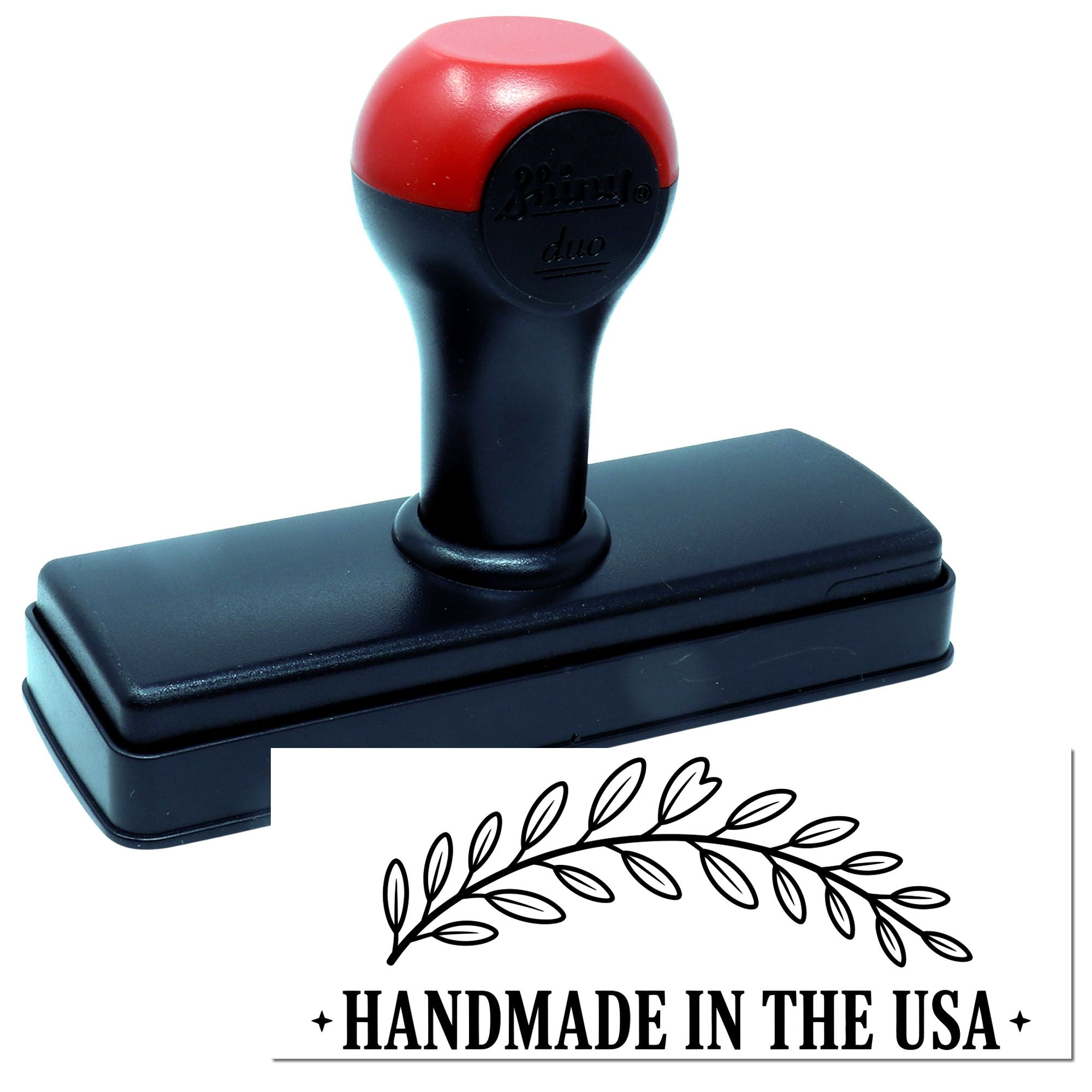 Self-inking rubber stamp with Handmade in the USA wreath design, ideal for custom branding and craft packaging.