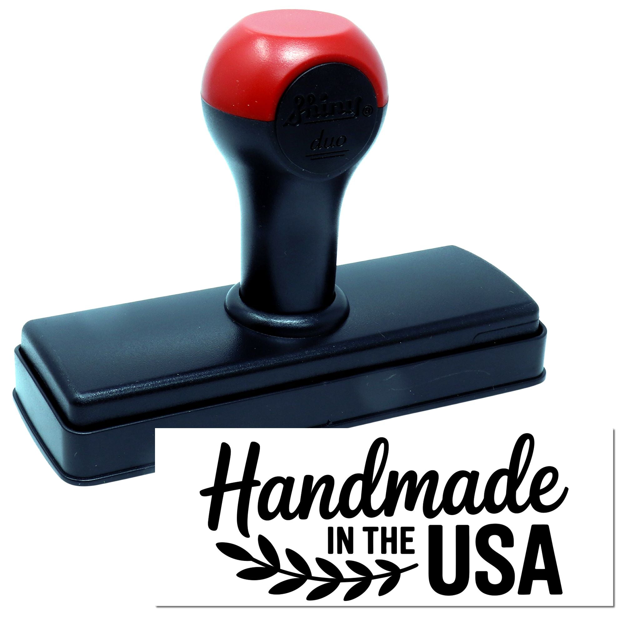 Self-inking rubber stamp with Handmade in the USA design for custom product branding and packaging.