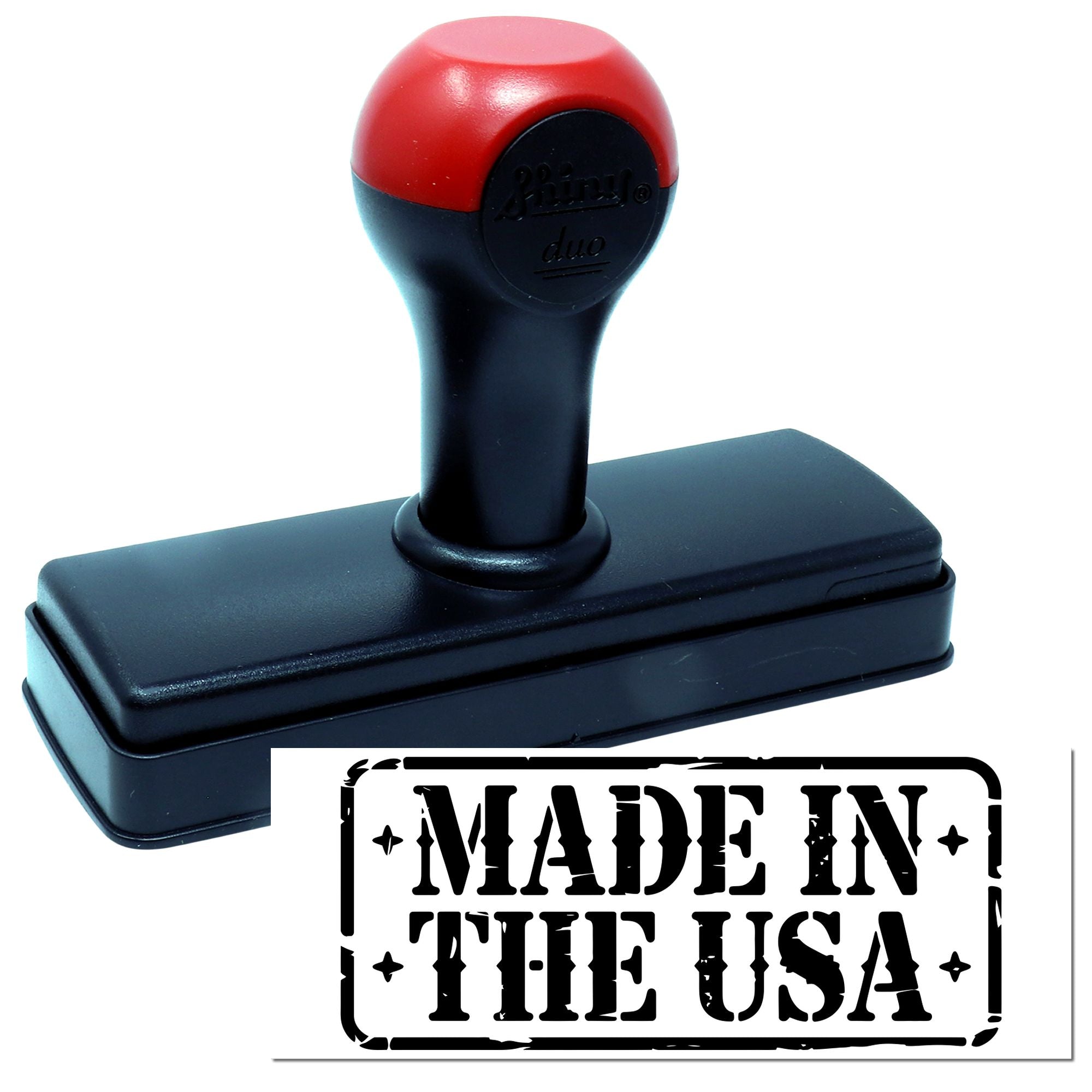 Self-inking rubber stamp with Made in the USA imprint for packaging, product labels, and patriotic business branding.