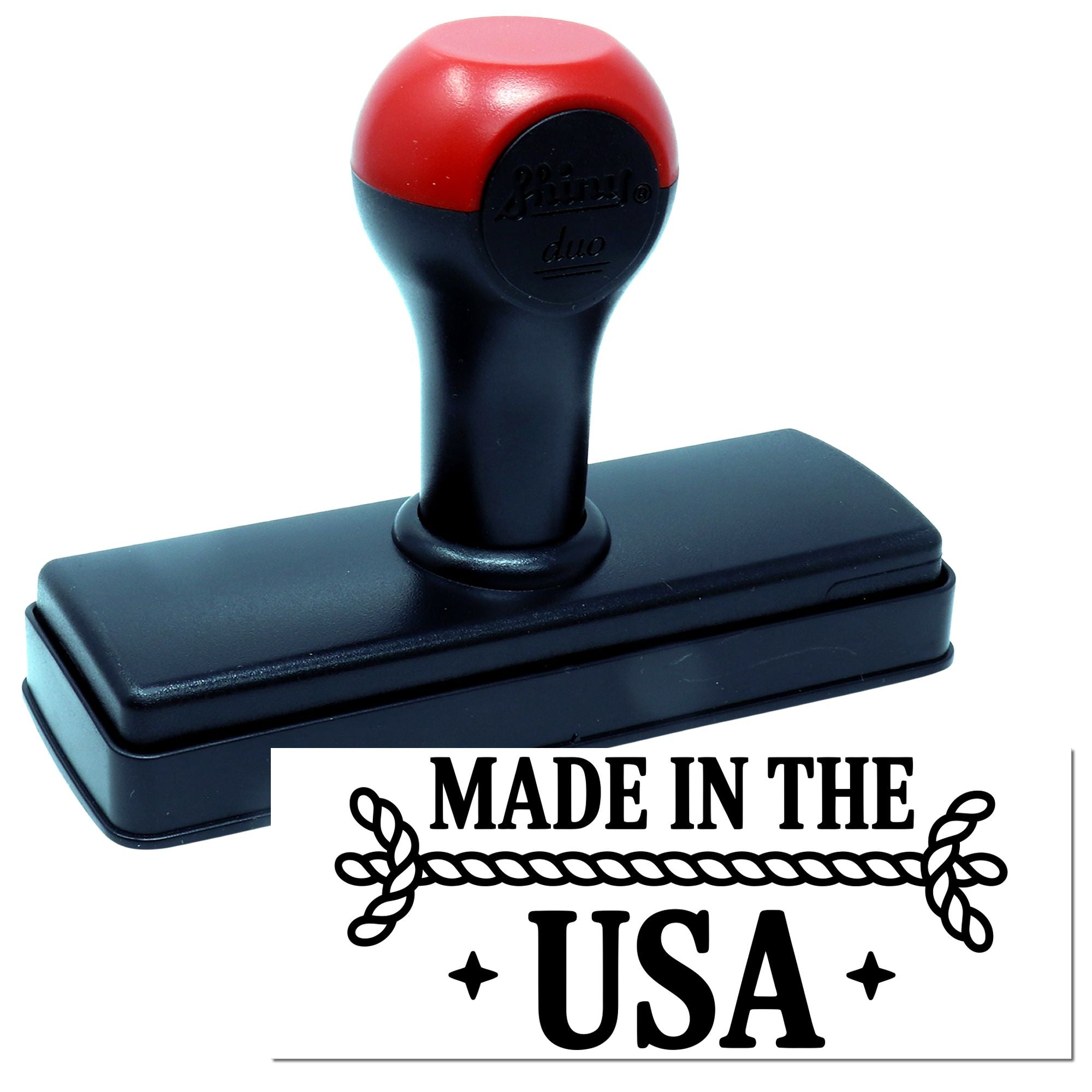Self-inking rubber stamp displaying Made in the USA for product labeling, packaging, and patriotic branding.