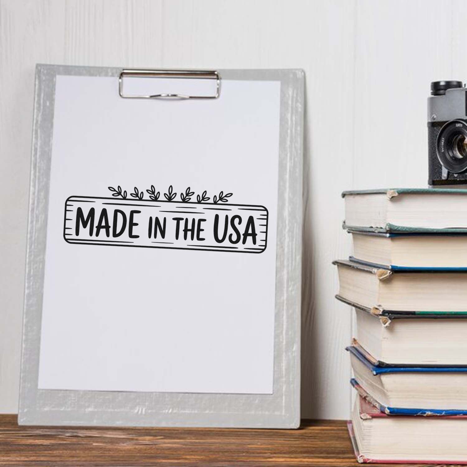 Made in the USA rubber stamp design on a clipboard, ideal for handmade products, packaging, and craft branding.