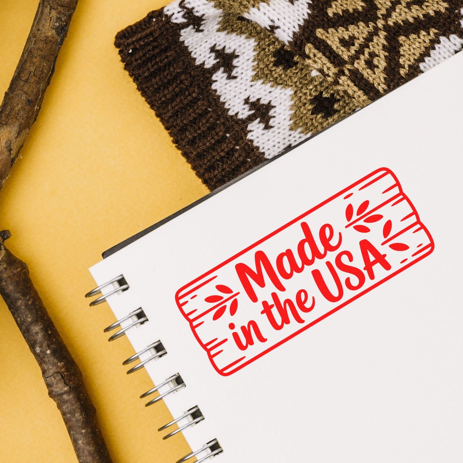 Made in the USA rubber stamp on notebook, ideal for patriotic branding, product labeling, and handcrafted packaging.