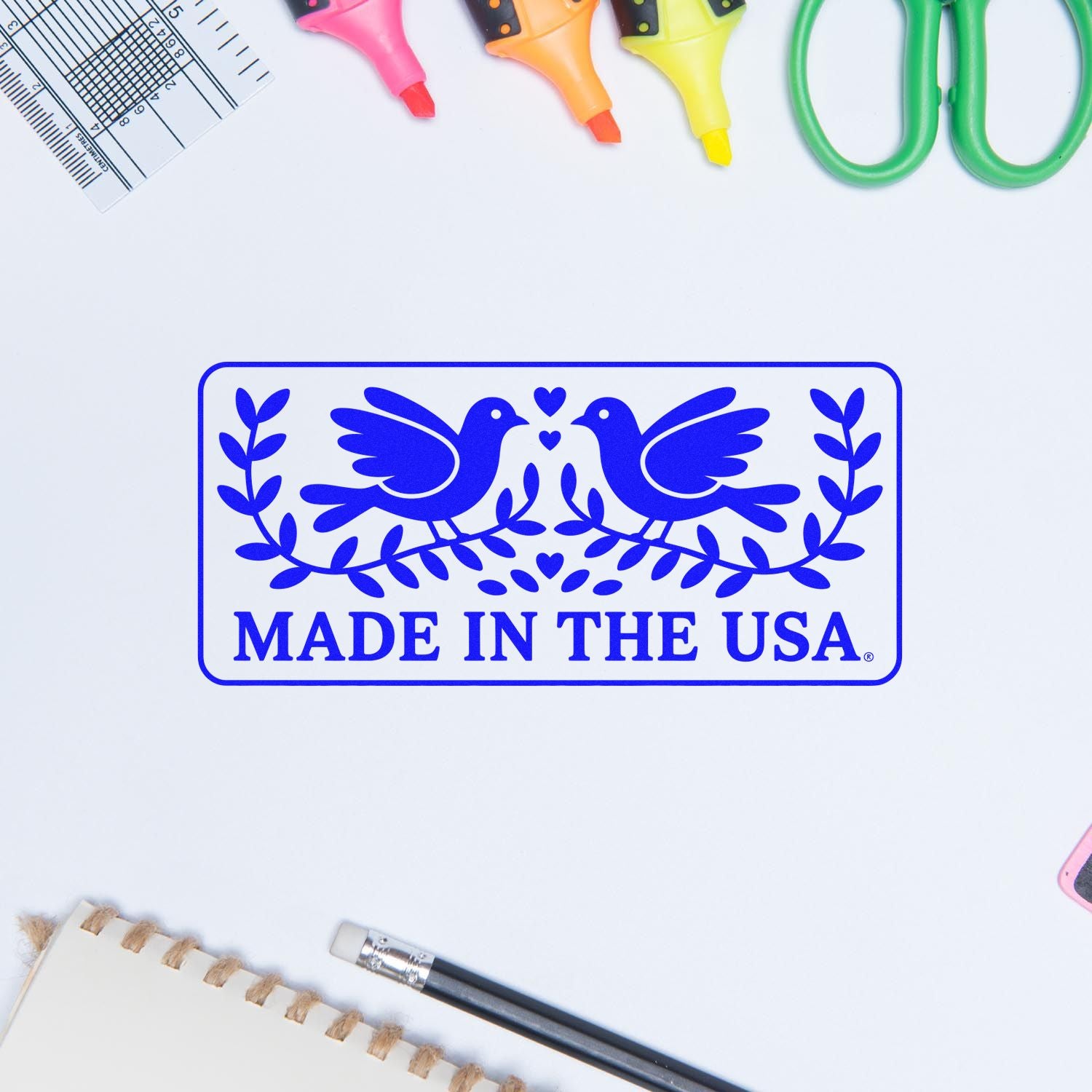 Made in the USA rubber stamp with blue birds and hearts, ideal for product branding and packaging.