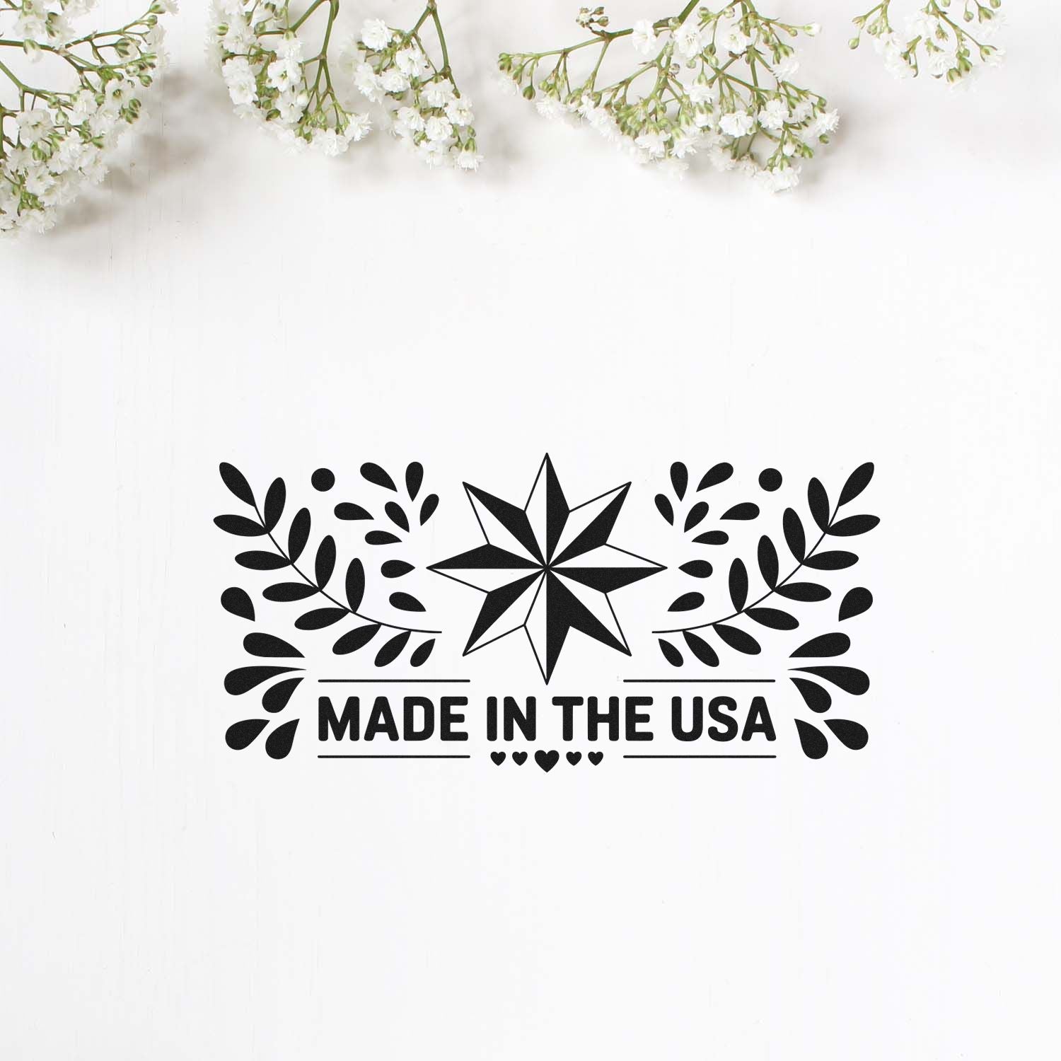 Made in the USA rubber stamp design with star and leaf accents for handmade product branding and packaging.