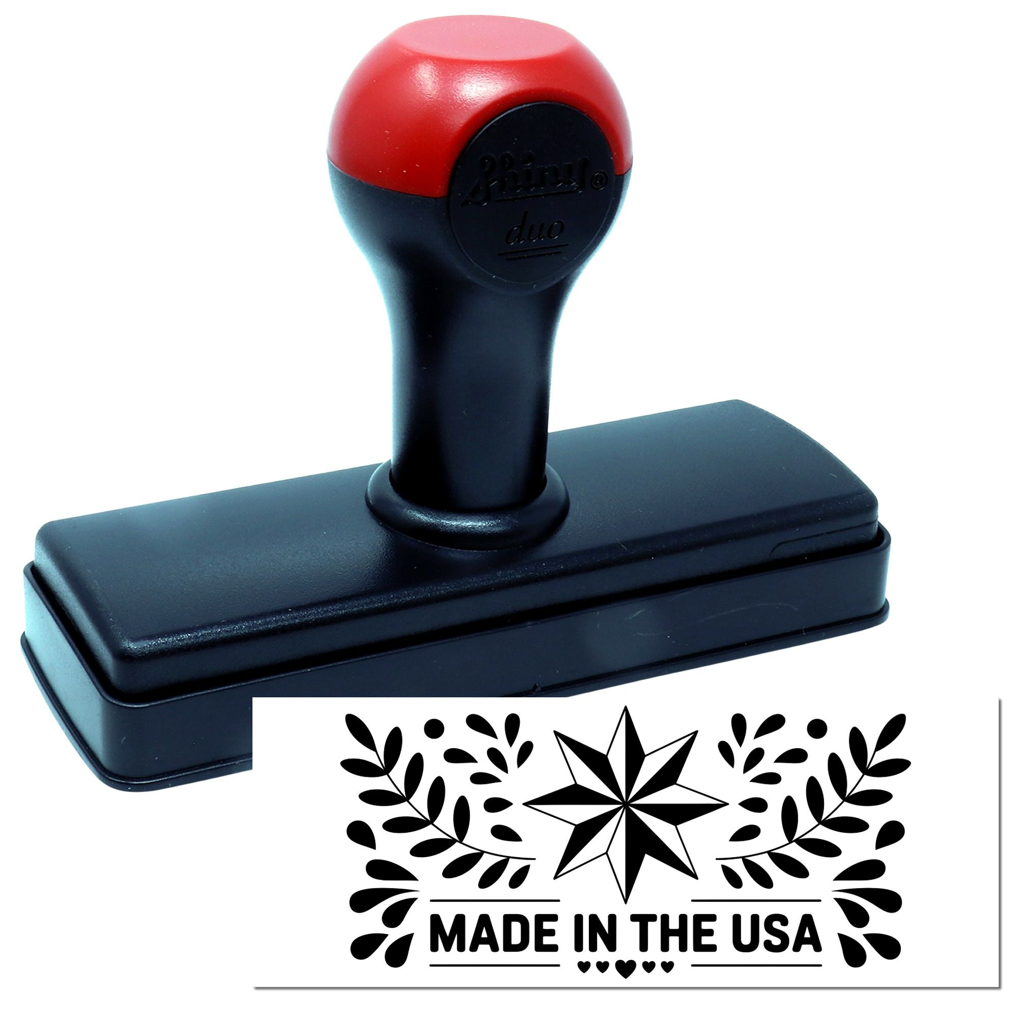 Self-inking Made in the USA rubber stamp with decorative star and leaf design for product packaging and branding.