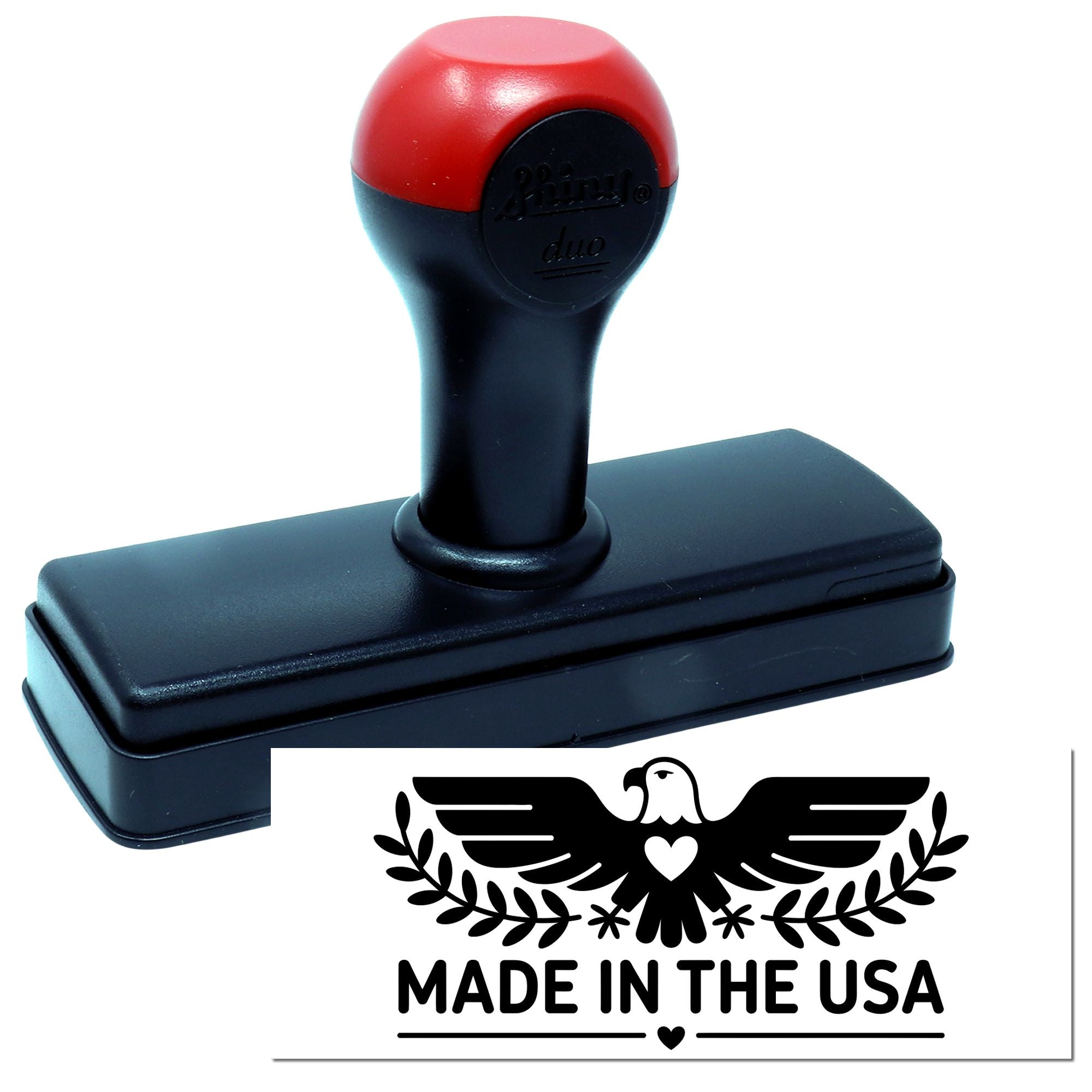 Self-inking rubber stamp with Made in the USA eagle impression for patriotic branding and packaging.