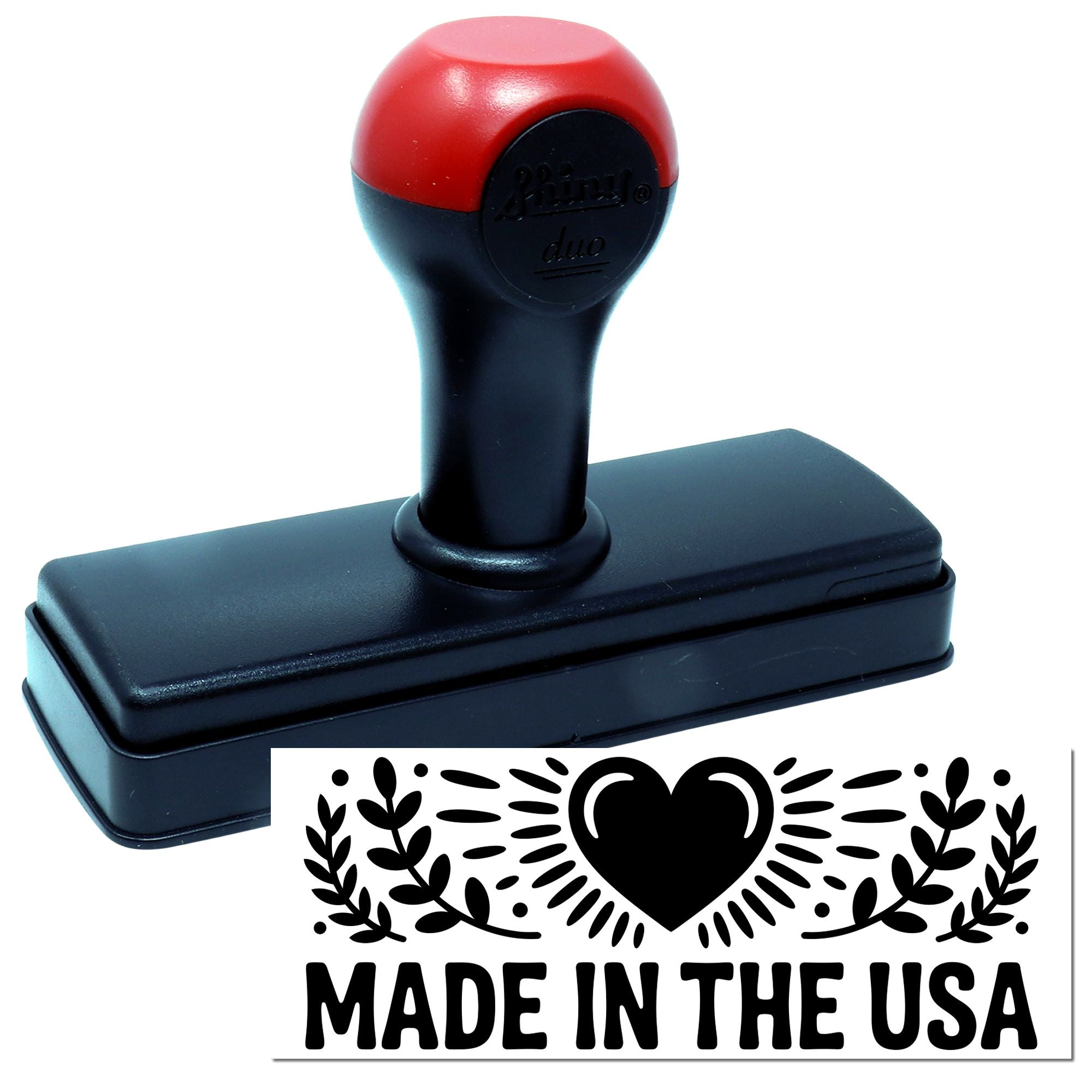 Self-inking rubber stamp with Made in the USA heart-and-leaf design for product labeling and branding