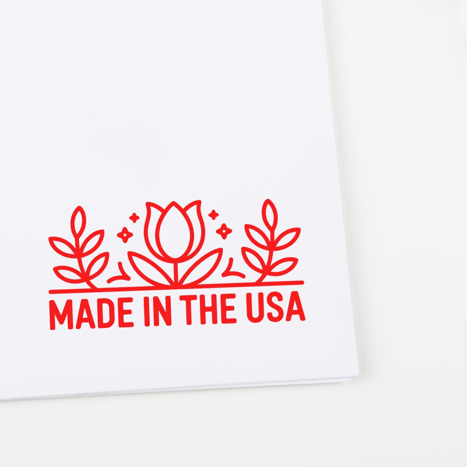 Made in the USA rubber stamp with floral tulip design for packaging, branding, and product labeling.