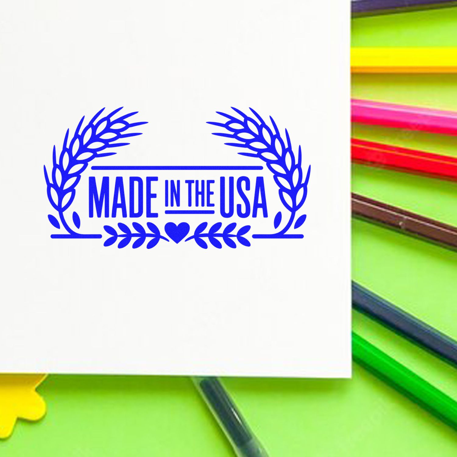 Made in the USA rubber stamp design with blue laurel wreath, ideal for product labeling, packaging, and branding.