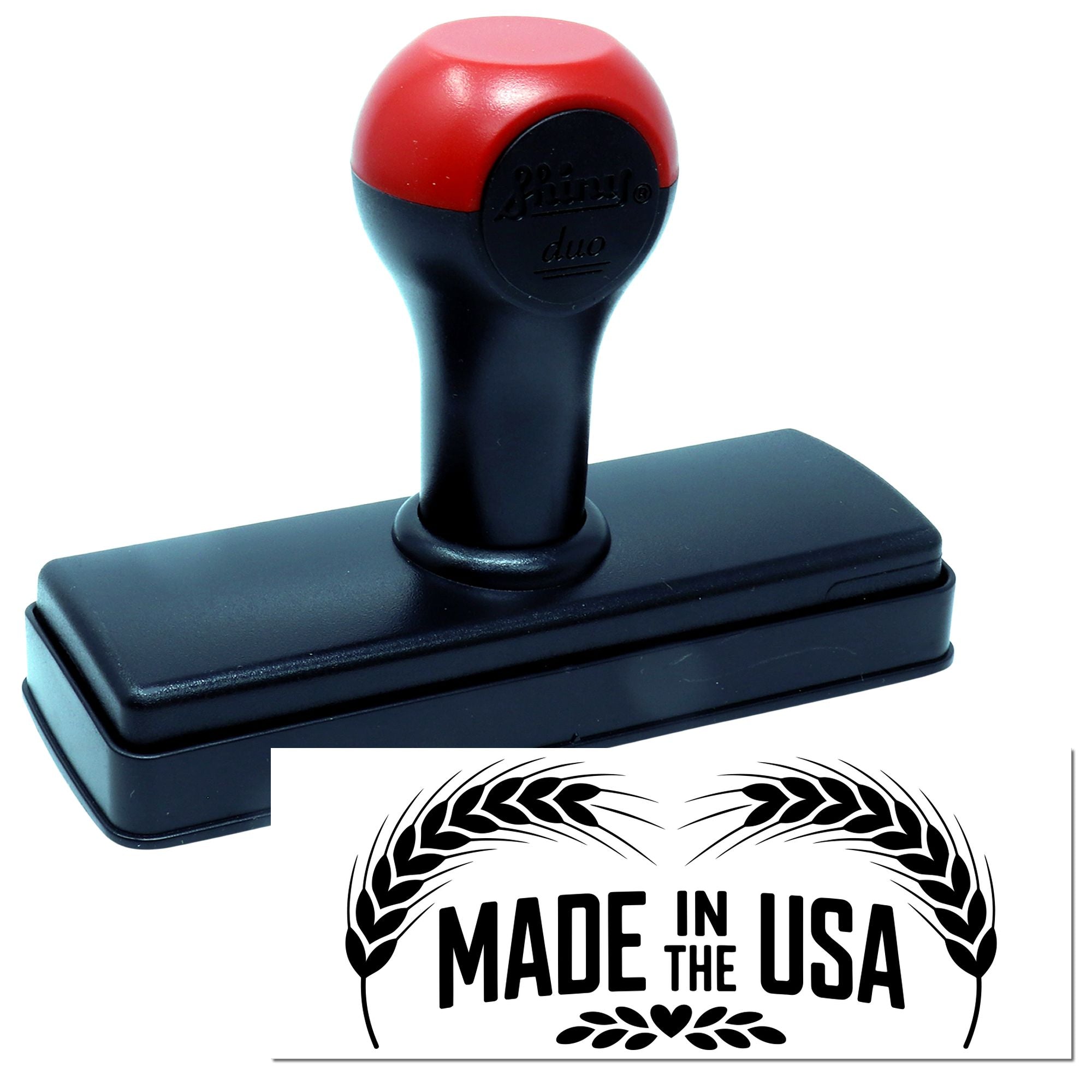 Self-inking rubber stamp with Made in the USA wheat design for patriotic branding and packaging.