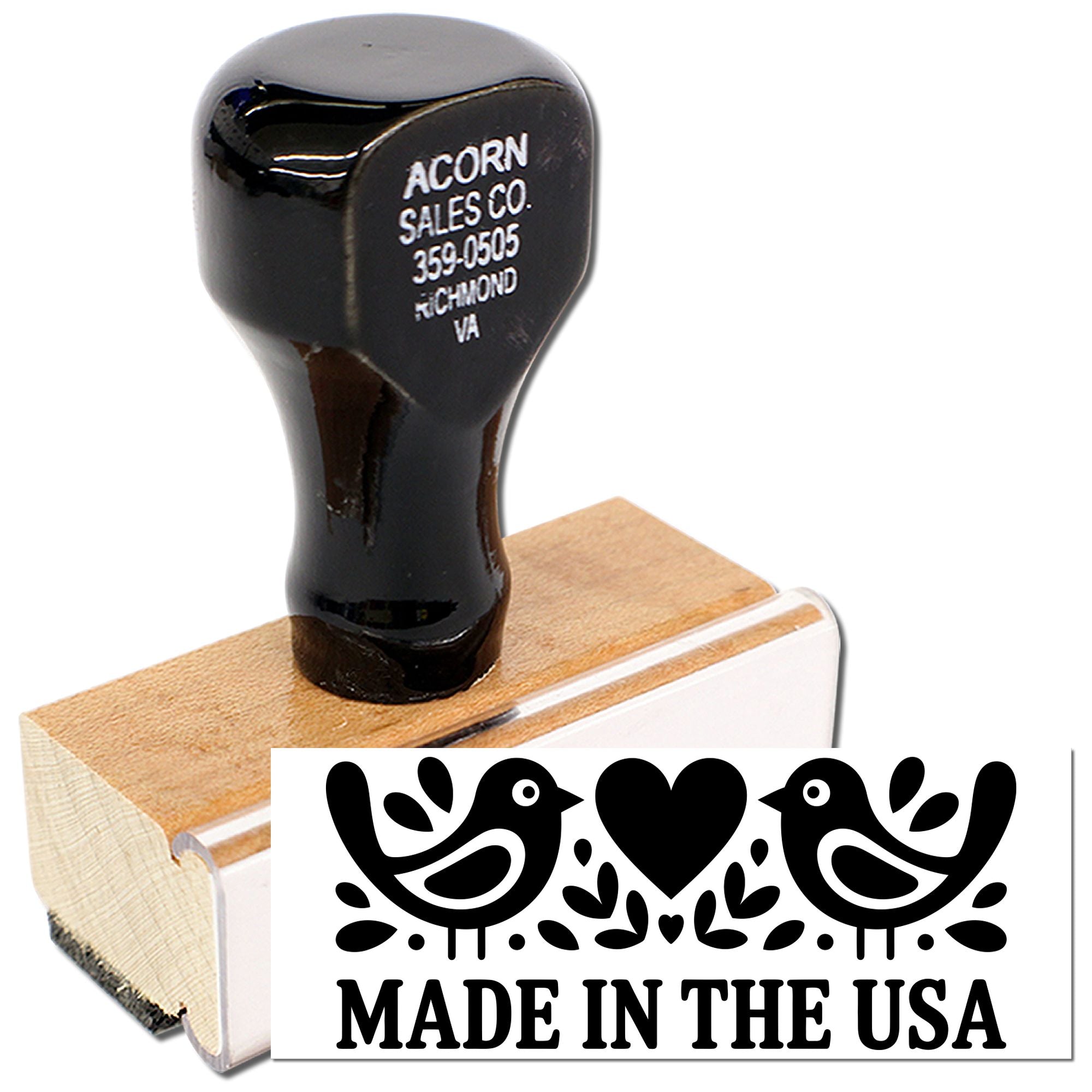 Custom Made in the USA rubber stamp with bird-and-heart design, mounted on a wood handle.