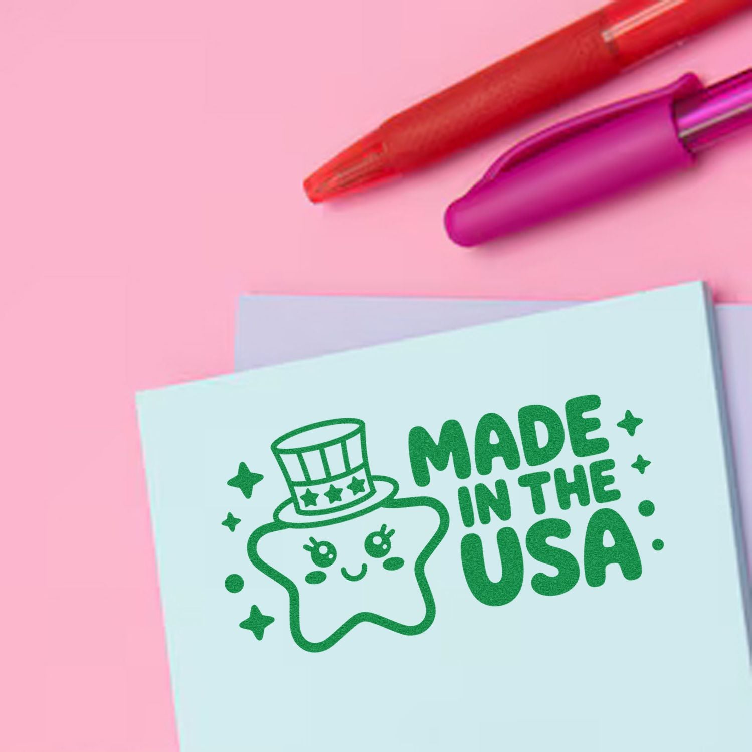 Made in the USA custom rubber stamp impression with star mascot on pastel paper, ideal for patriotic branding.