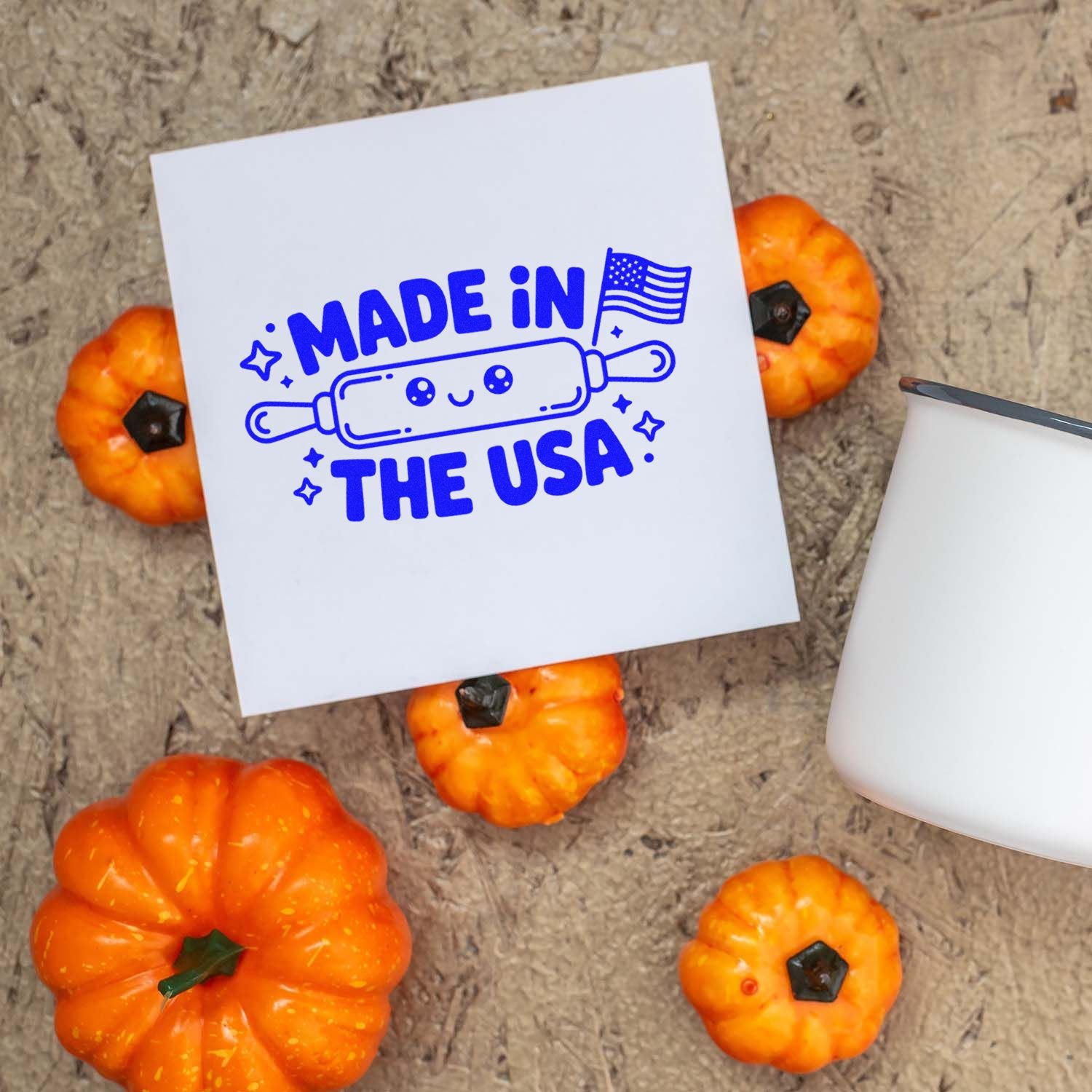 Made in the USA rubber stamp design with rolling pin graphic, patriotic flag, and pumpkins for custom craft packaging and seasonal branding.