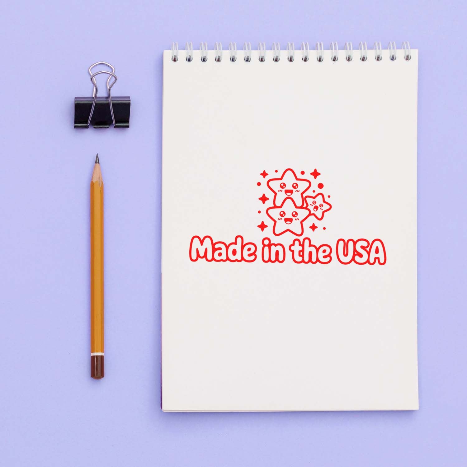 Made in the USA rubber stamp design on a spiral notebook, ideal for patriotic product labeling and packaging.