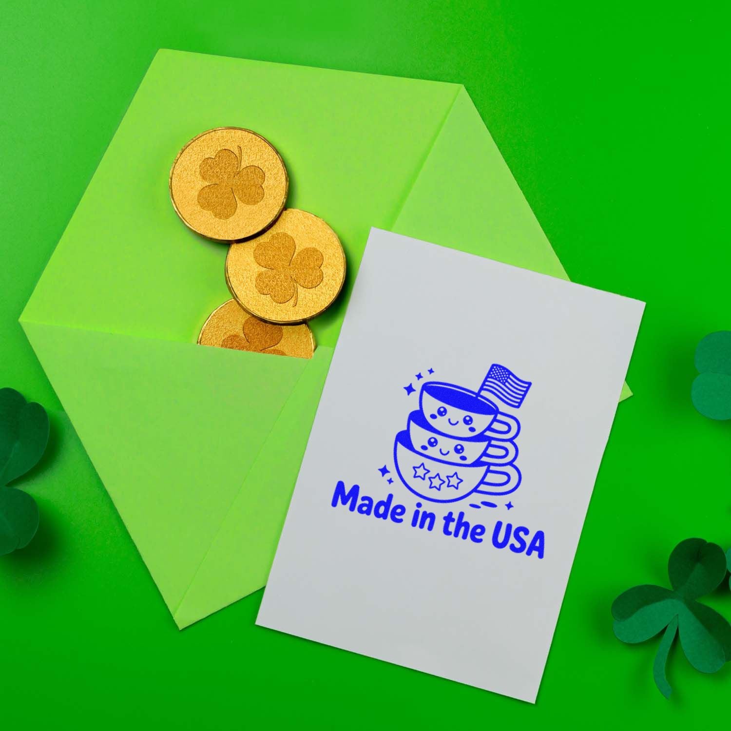 Made in the USA rubber stamp mockup on a card with green envelope, showcasing a patriotic custom stamp for packaging and branding.