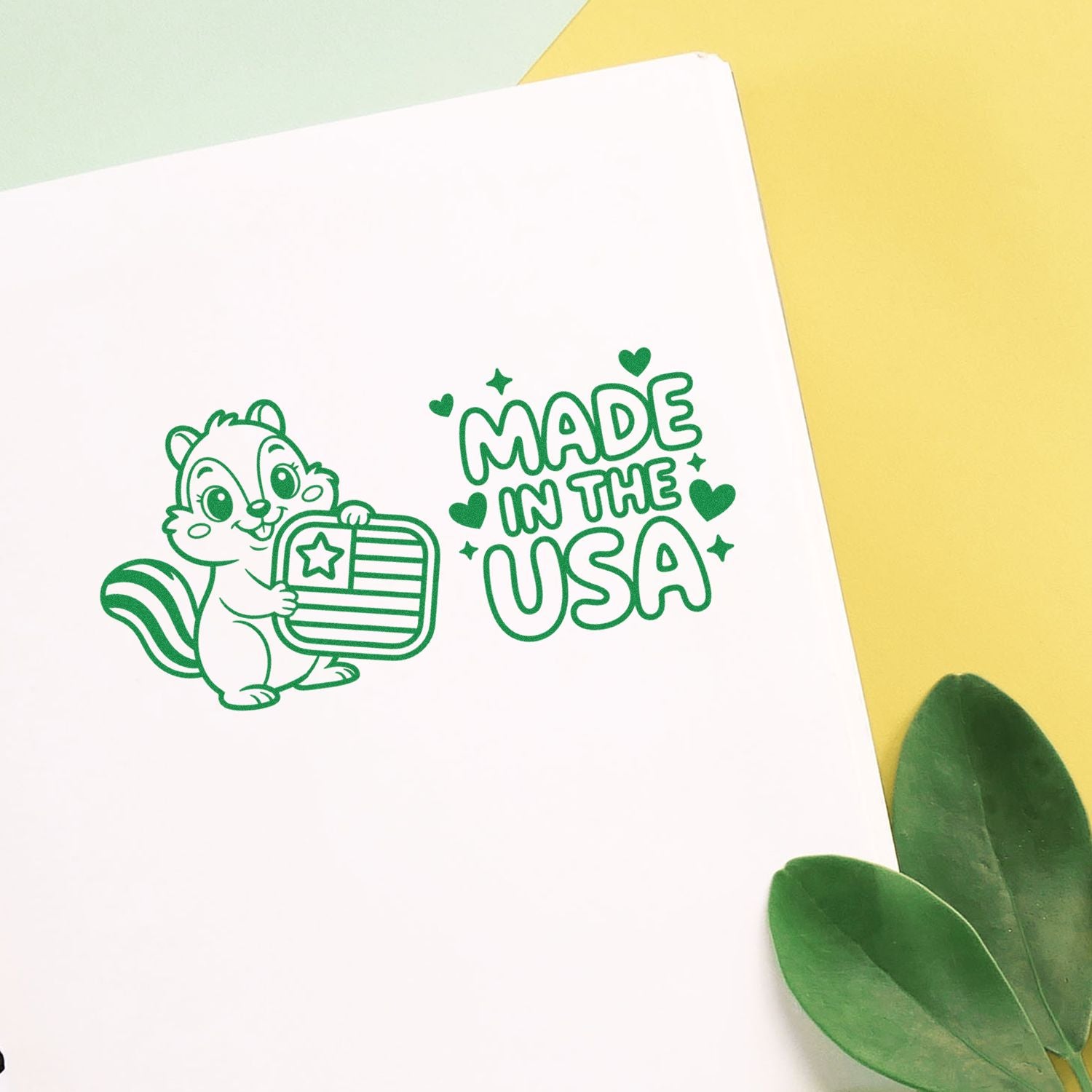 Made in the USA rubber stamp design with cute chipmunk holding an American flag, ideal for patriotic crafts.