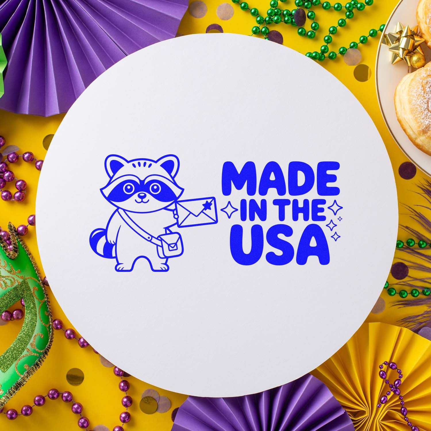 Made in the USA rubber stamp design with raccoon mail carrier graphic on a festive Mardi Gras party backdrop.