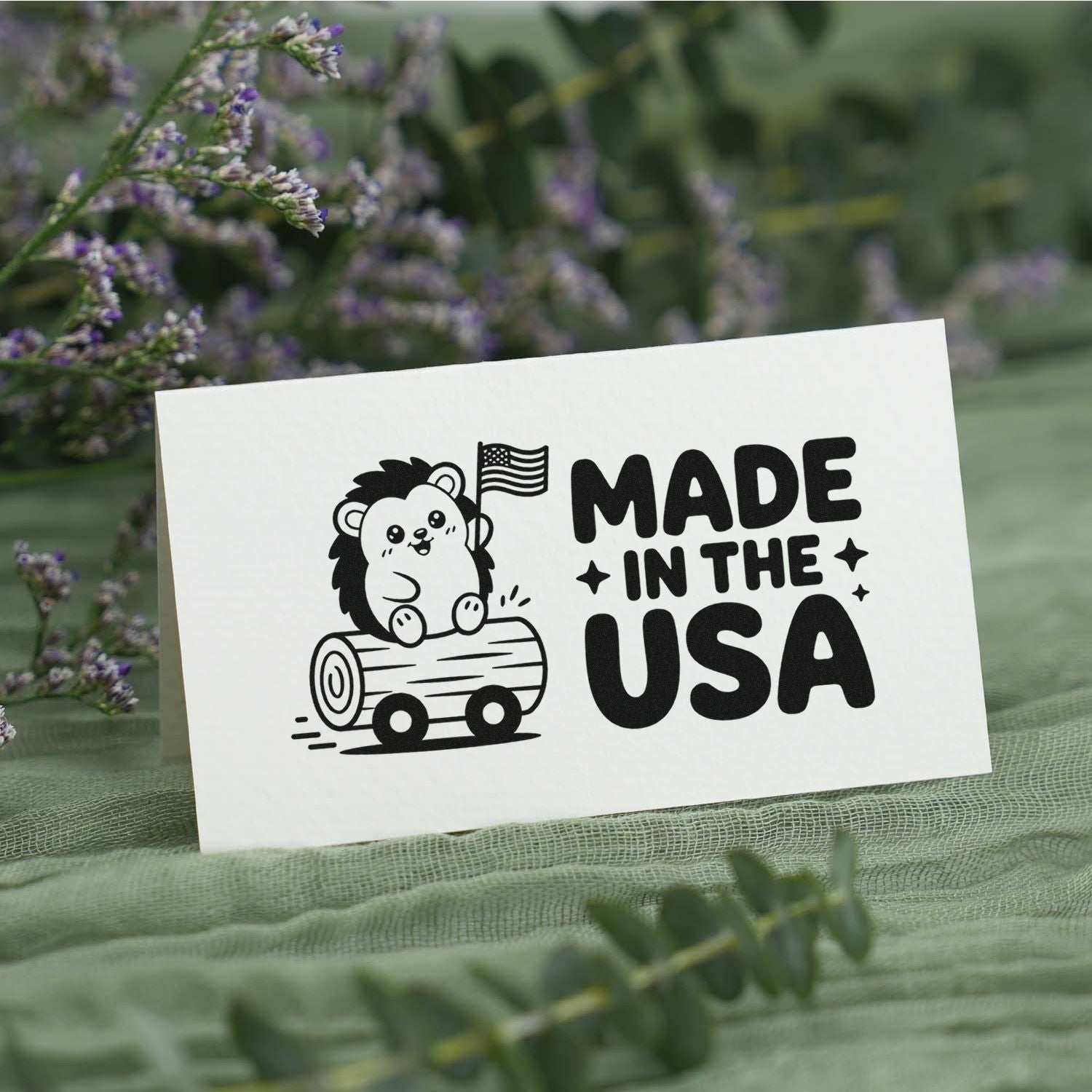 Made in the USA rubber stamp design featuring a cute hedgehog on a log with flag, perfect for patriotic handmade packaging.
