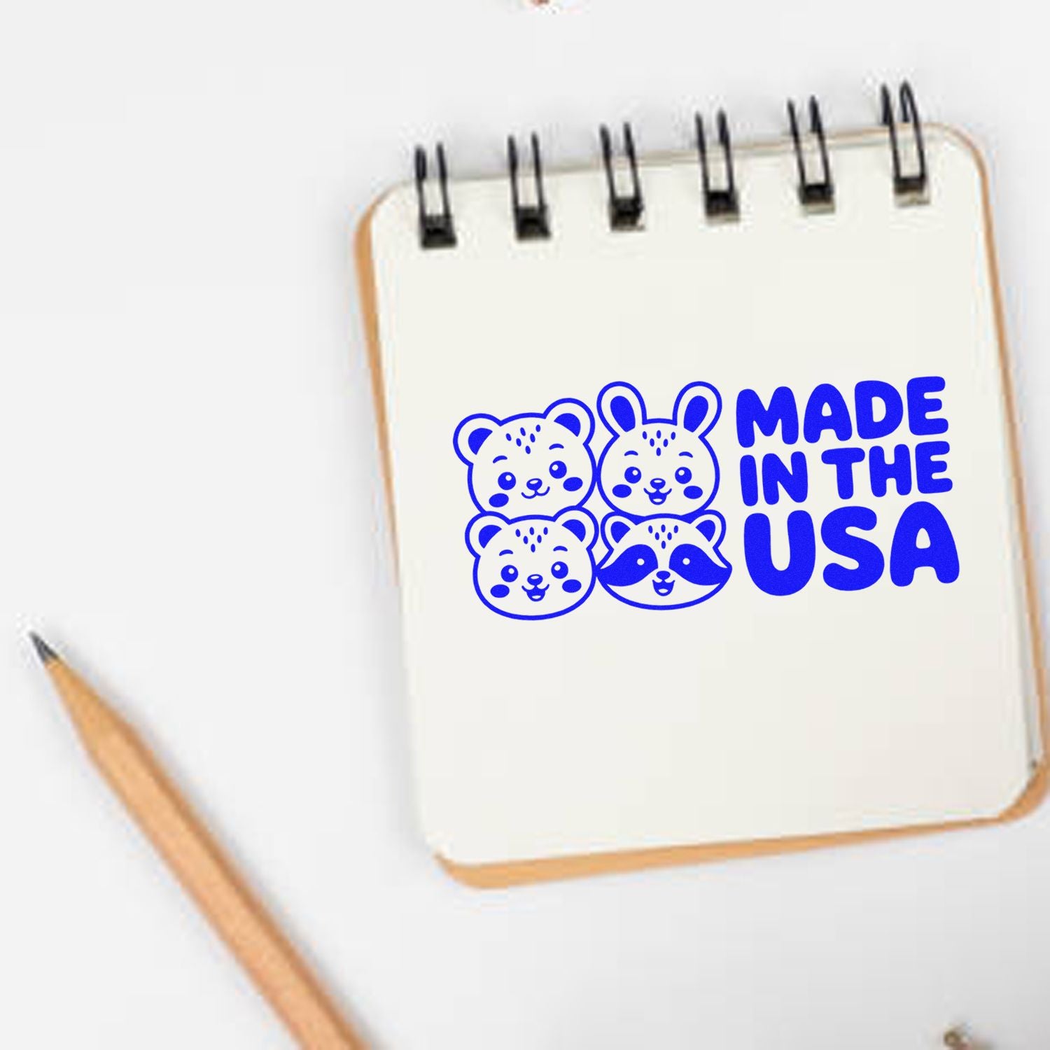 Made in the USA rubber stamp design with cute animal faces for handmade product packaging and branding.