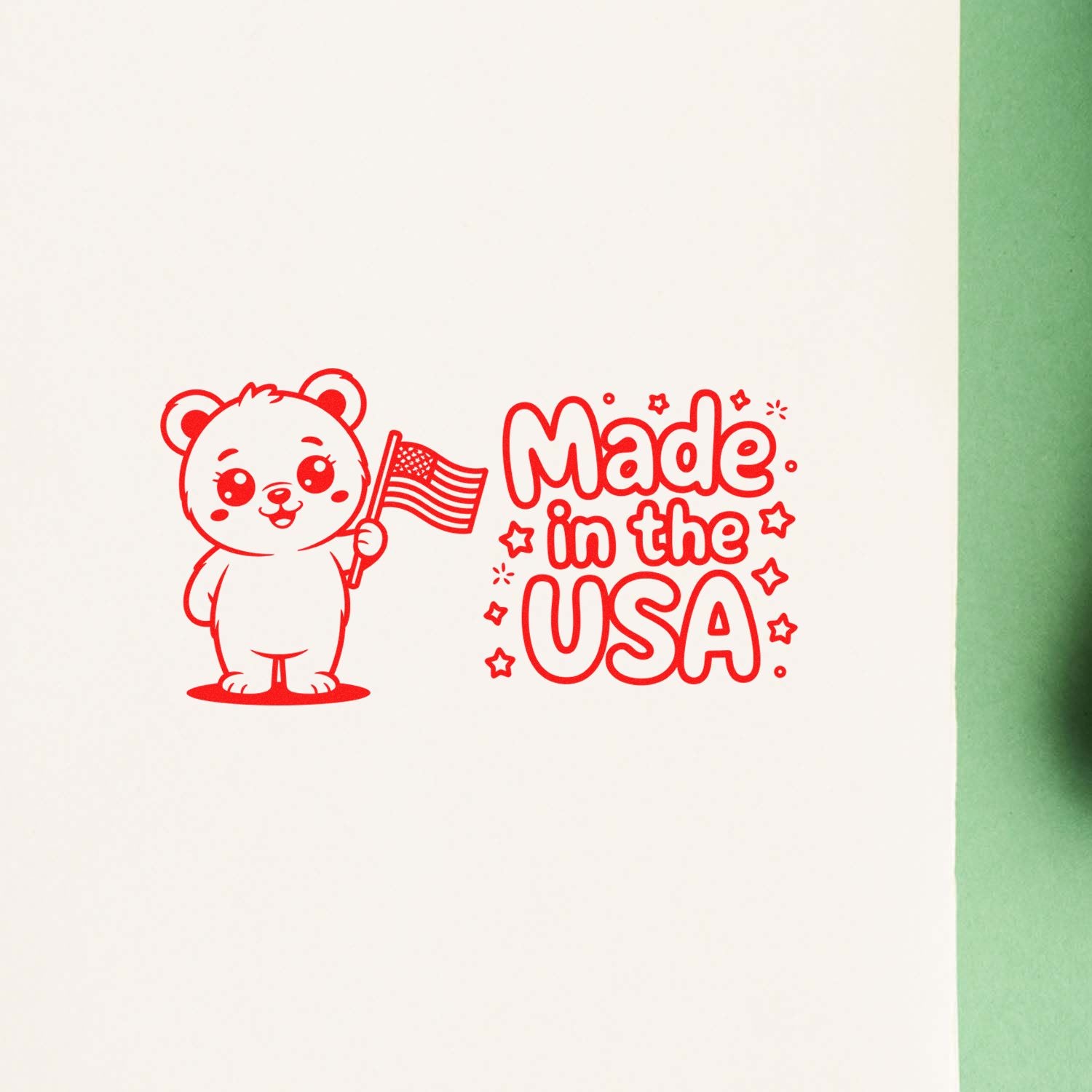 Made in the USA rubber stamp design with cute bear holding American flag, ideal for patriotic packaging and crafts.