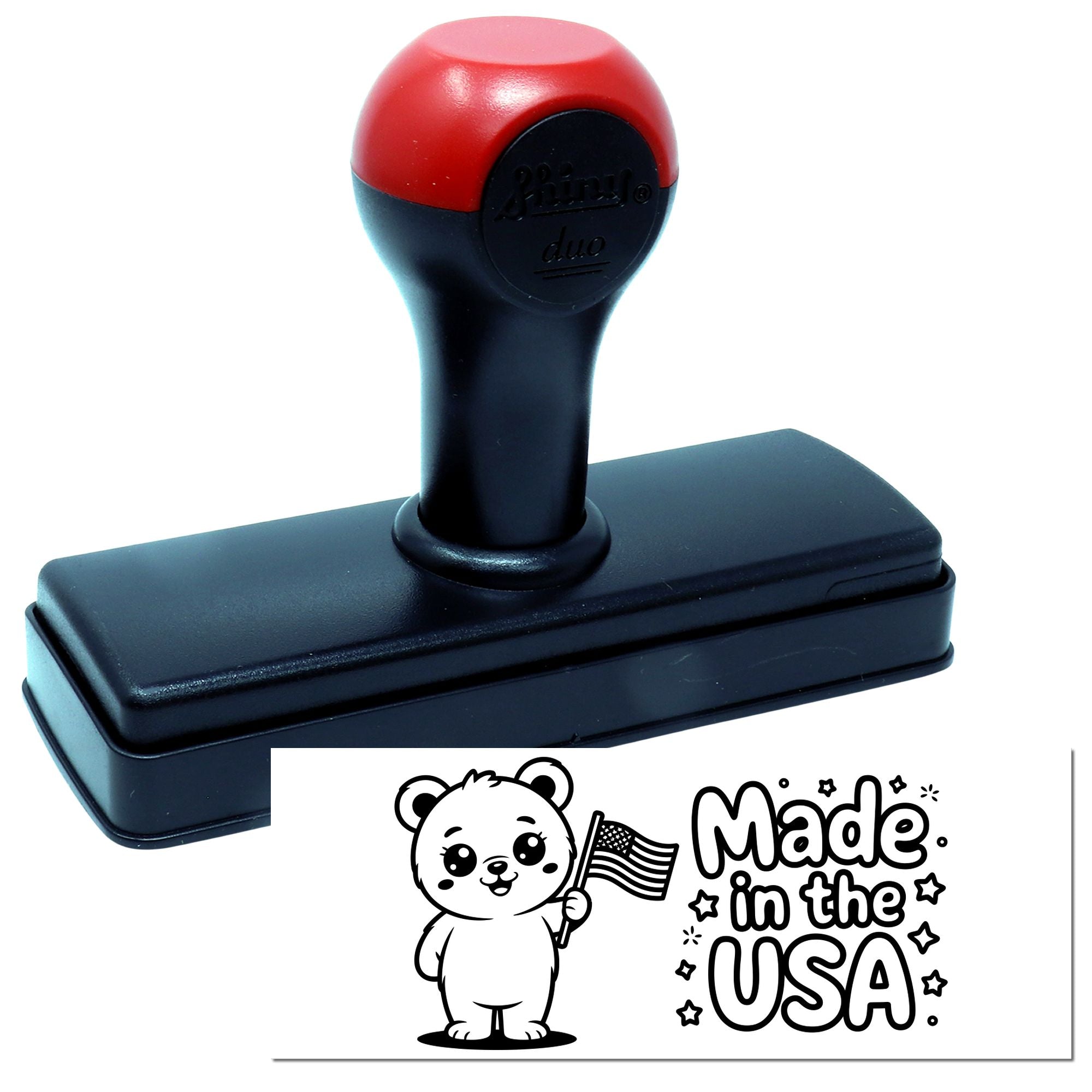 Self-inking rubber stamp with Made in the USA bear and flag design for patriotic product labeling.