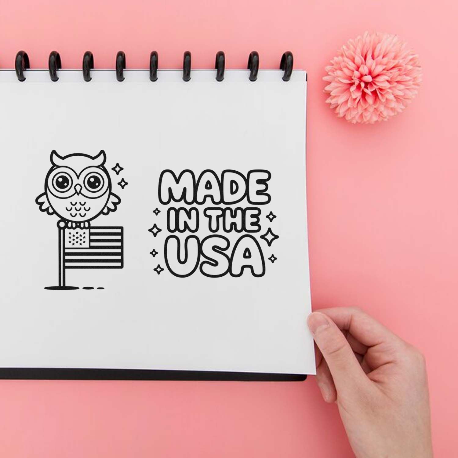 Made in the USA rubber stamp design with owl and American flag, displayed in a notebook on a pink background.