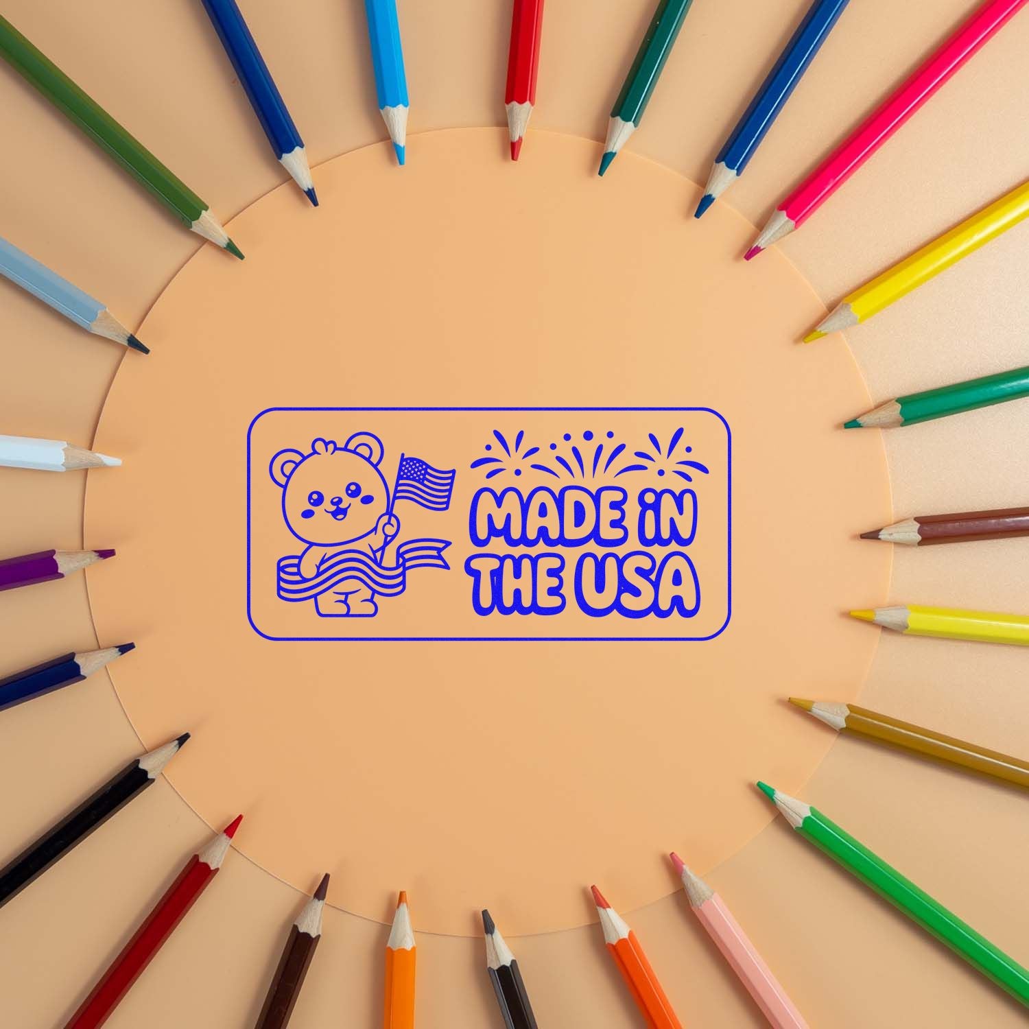 Made in the USA rubber stamp design with bear and flag, surrounded by colorful pencils for craft branding.