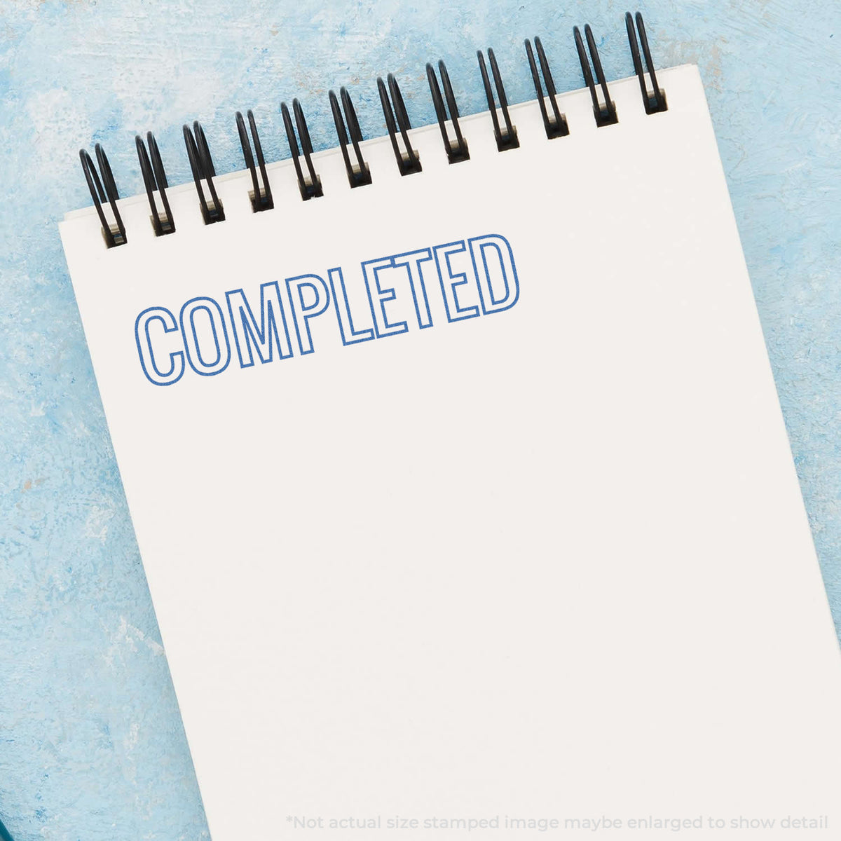 "Completed" mark stamped for document handling, Xstamper 1026 stamp