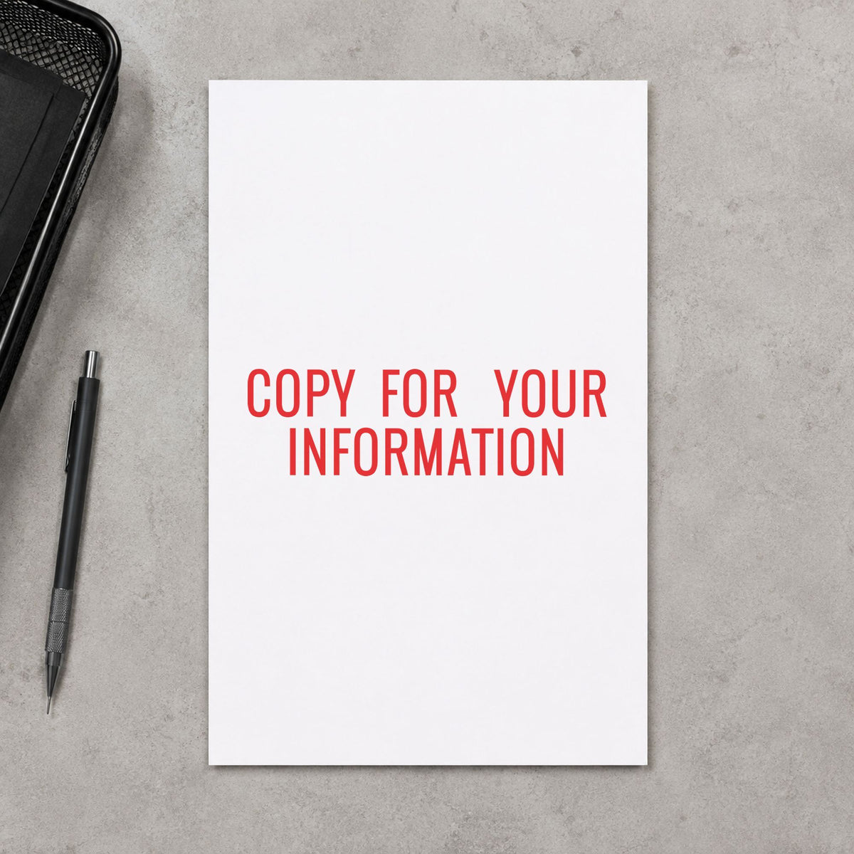 "Copy for your information" mark added to paperwork with a pre-inked Xstamper stamp