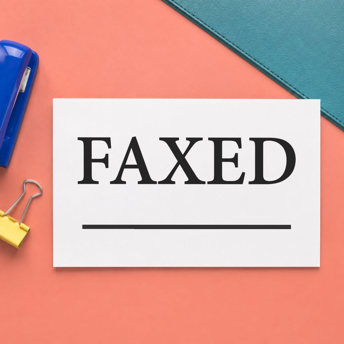 "Faxed" imprint stamped on a document with the Xstamper Faxed Document Stamp – Black Pre-Inked