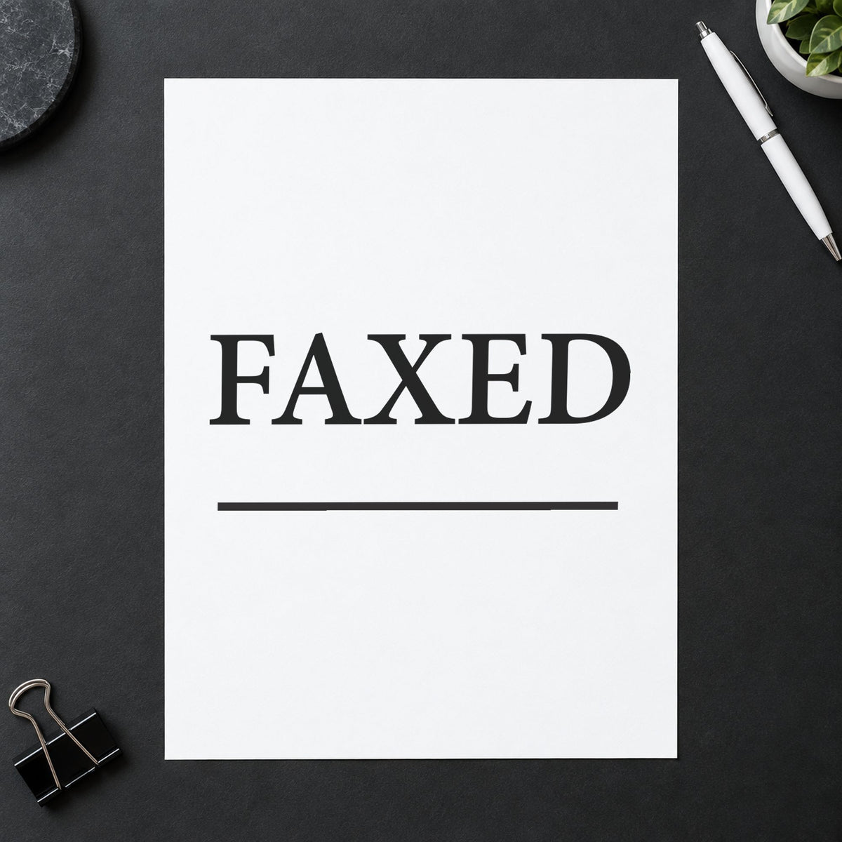 Xstamper Faxed Document Stamp – Black Pre-Inked leaving a clean "Faxed" impression
