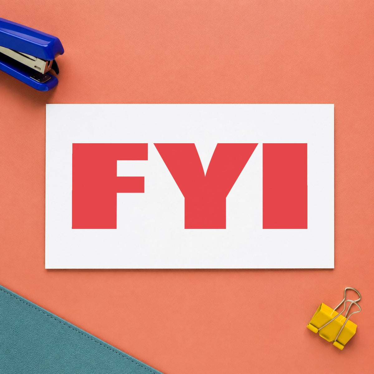 "FYI" imprint stamped on a document with the FYI Stamp – Bold Red Pre-Inked Xstamper