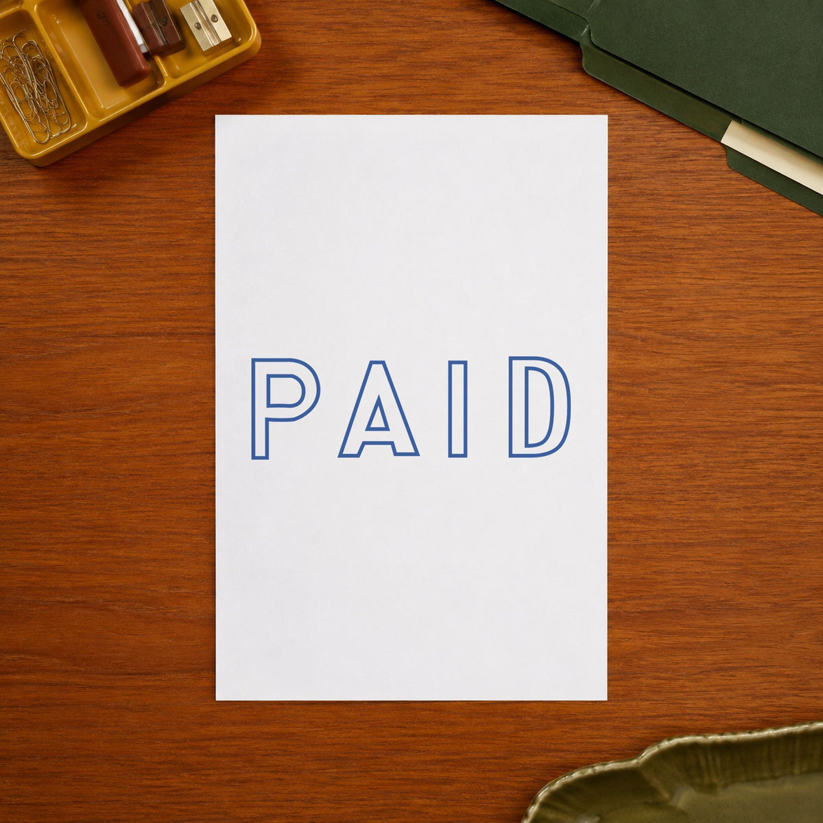 "Paid" impression shown close up, rectangular imprint at 1-5/8 x 1/2 in
