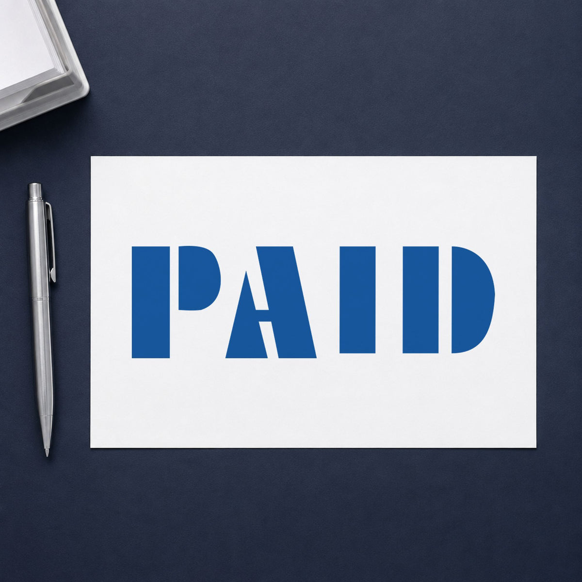 "Paid" imprint stamped on a document with the Paid Stamp – Blue Pre-Inked Xstamper