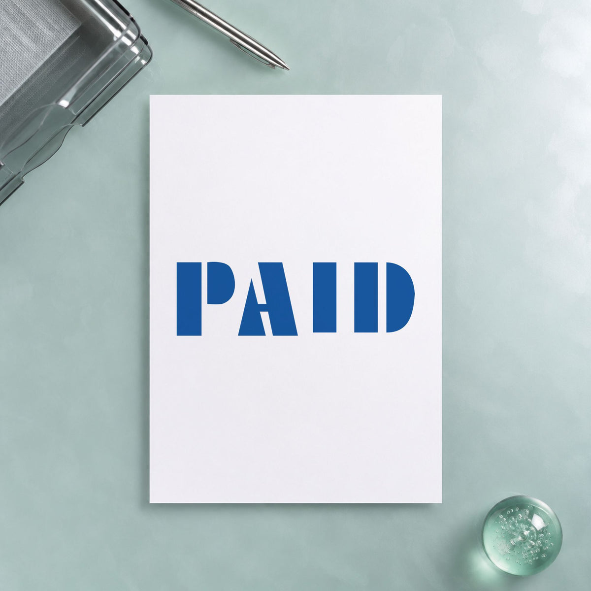 Crisp "Paid" imprint produced by the Paid Stamp – Blue Pre-Inked Xstamper