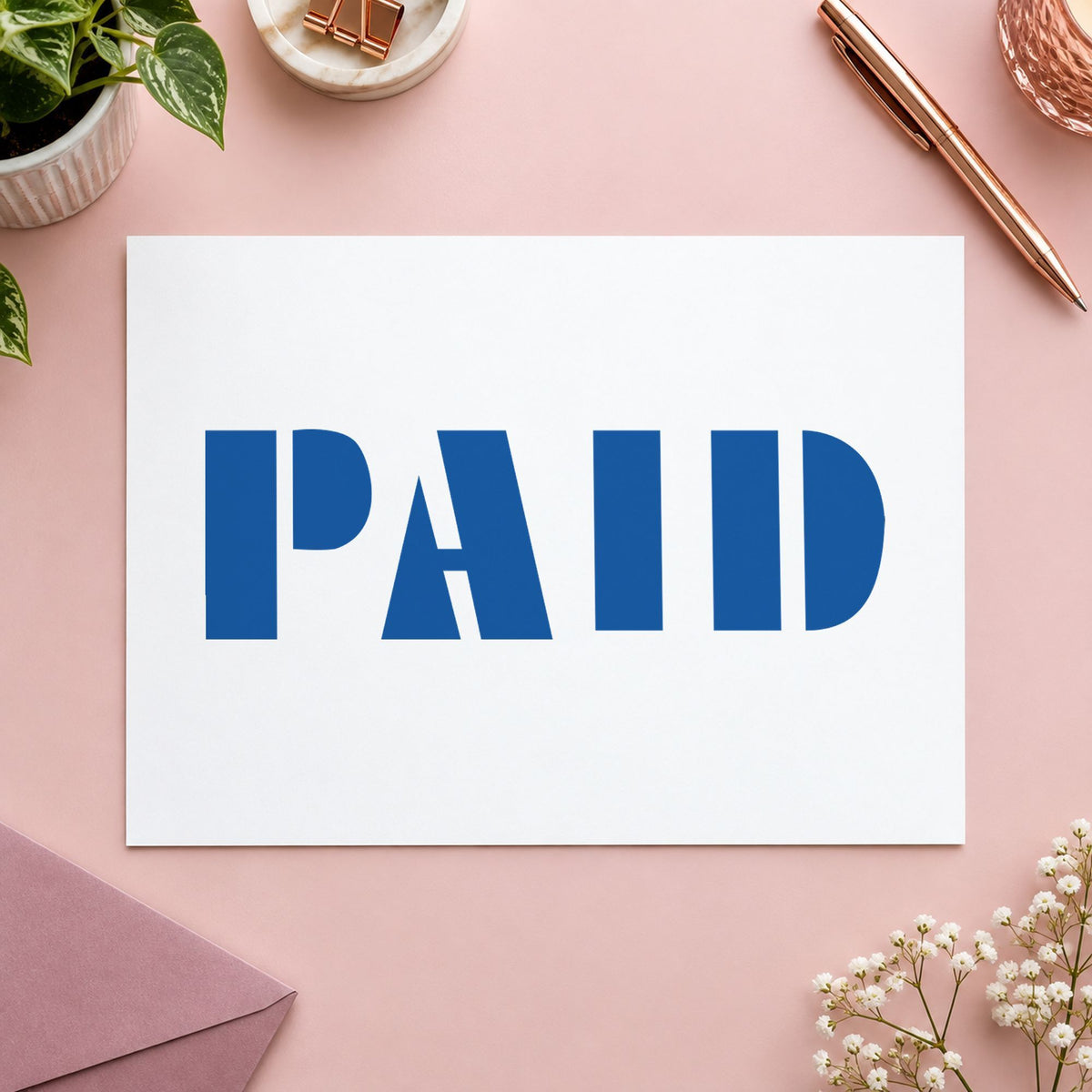 Marking a page "Paid" with the Paid Stamp – Blue Pre-Inked Xstamper