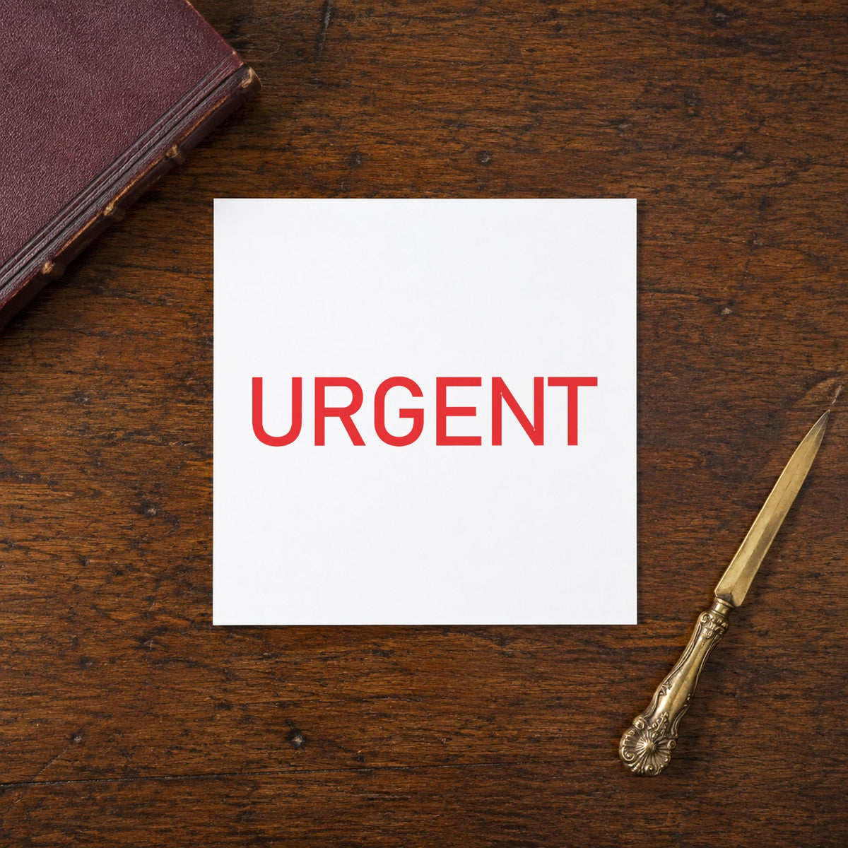 "Urgent" impression shown close up, rectangular imprint at 1/2 x 1-5/8 in