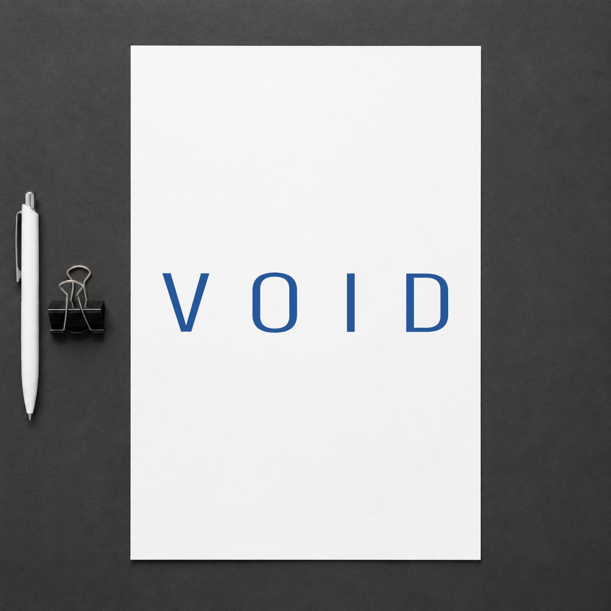 Marking a page "Void" with the Xstamper Void Stamp – Blue Pre-Inked